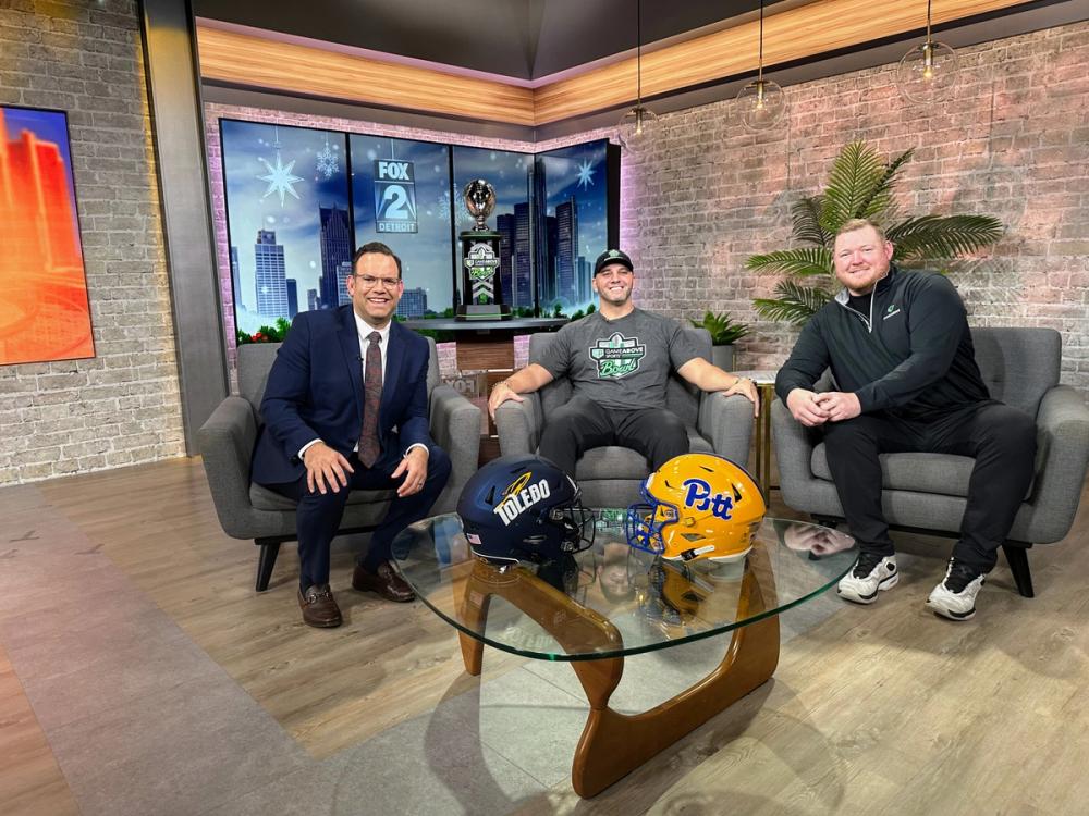 GameAbove ambassadors T.J. Lang and Anthony Tomey sitting with Fox 2 Detroit News Anchor Ryan Ermanni.