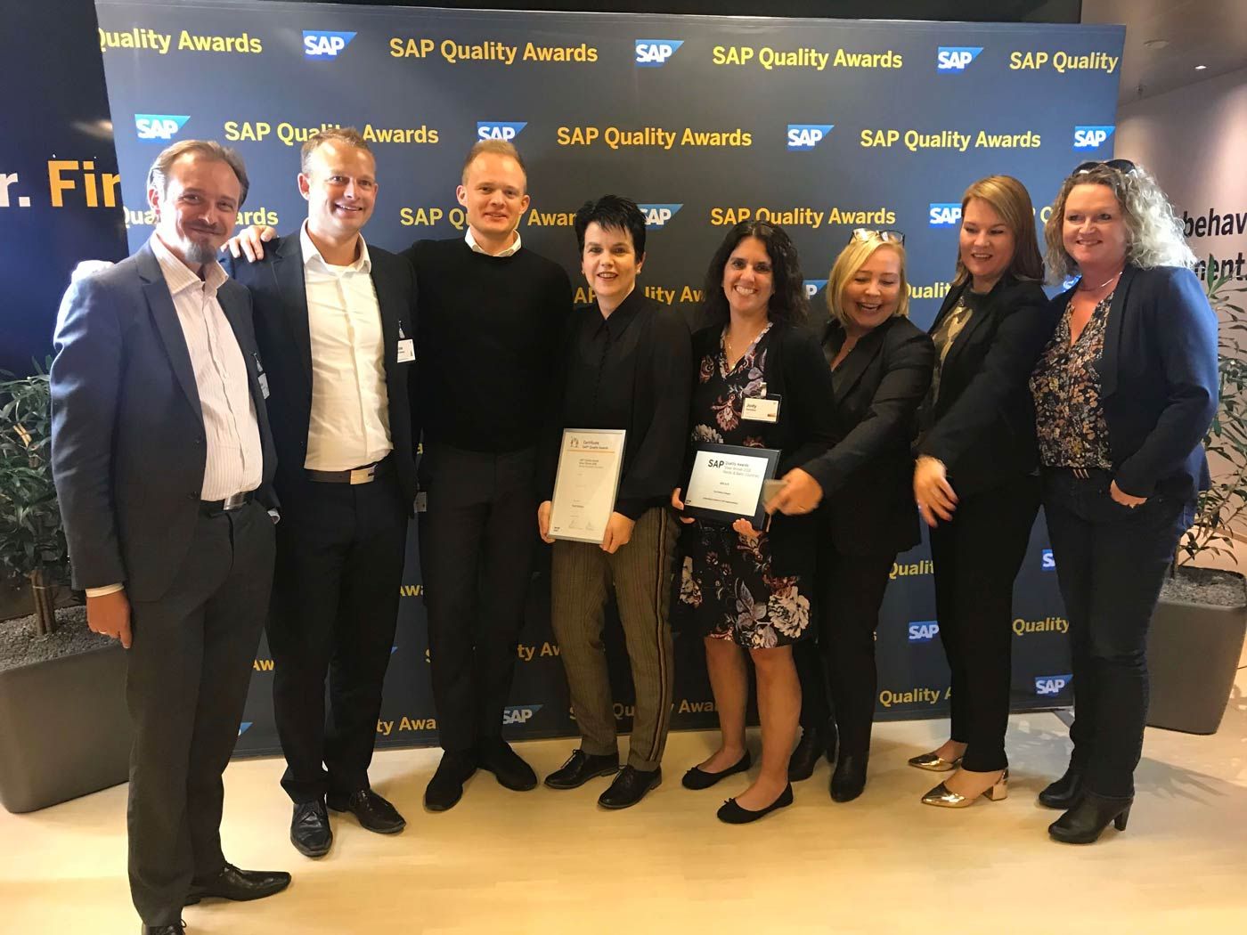 Effective People team accepting an SAP SuccessFactors award