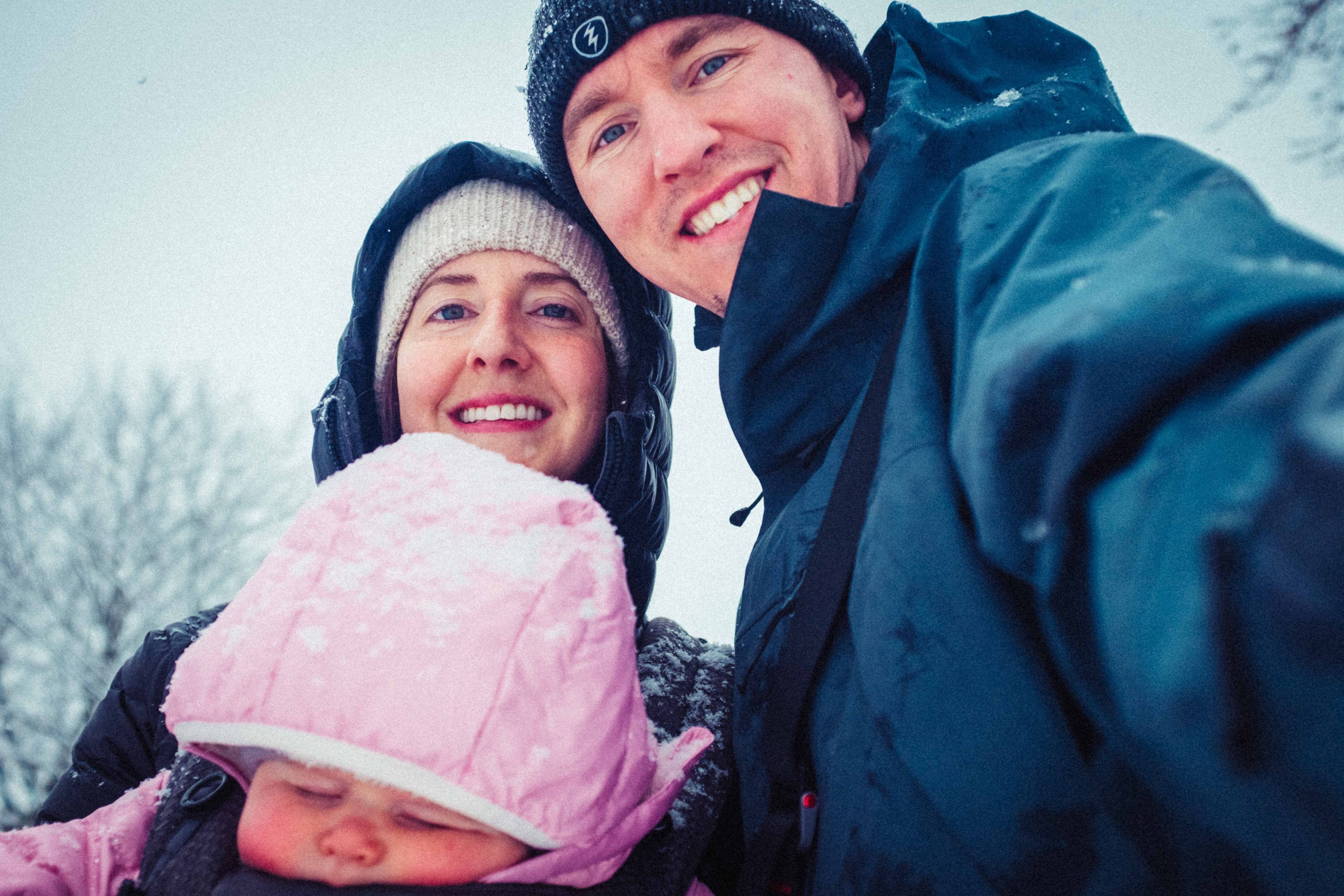 Cameron Husain is pictured with his family on a snowy day.