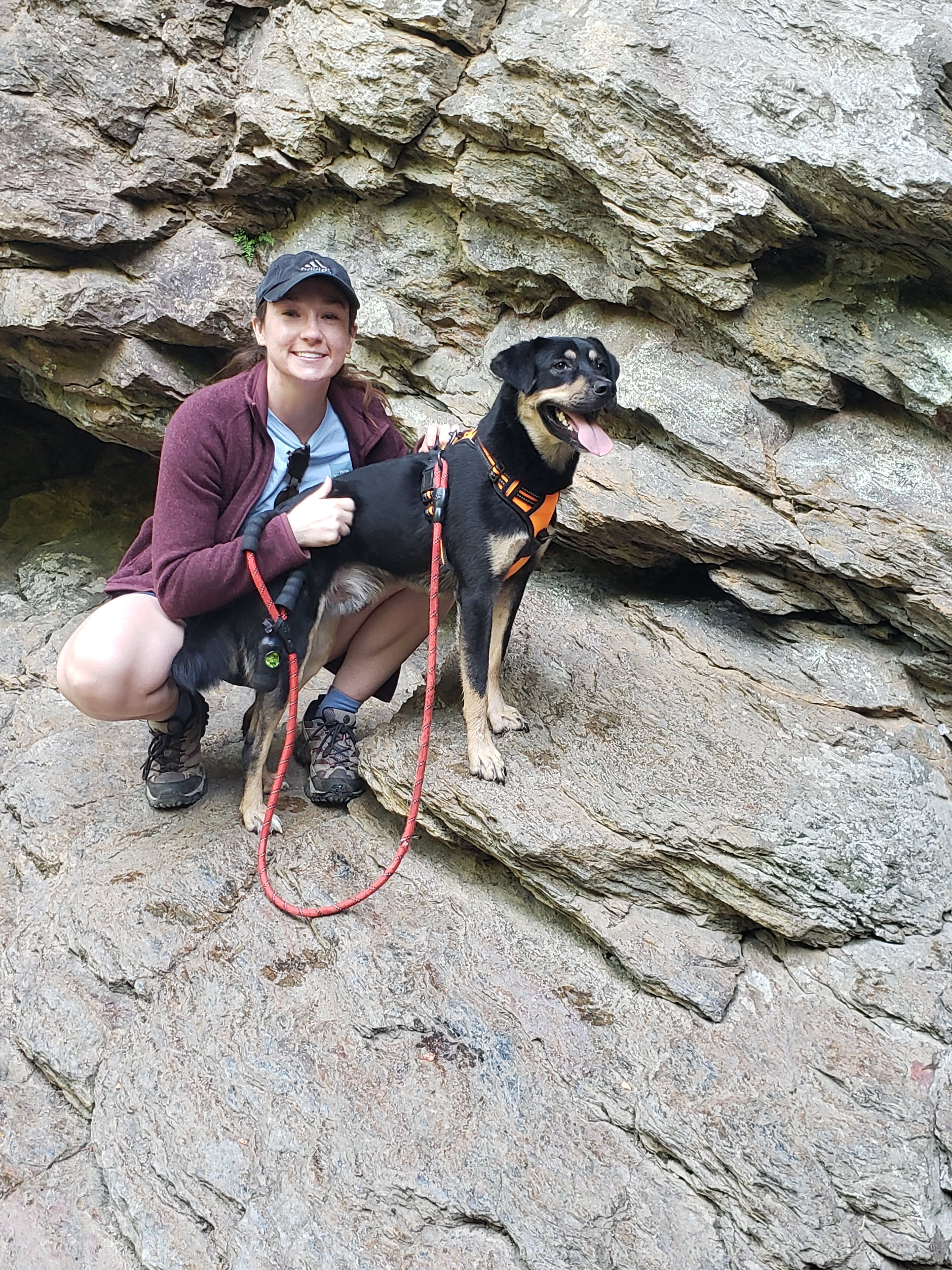 Sarah Zwicker is pictured with her dog Cooper on a hiking trip.