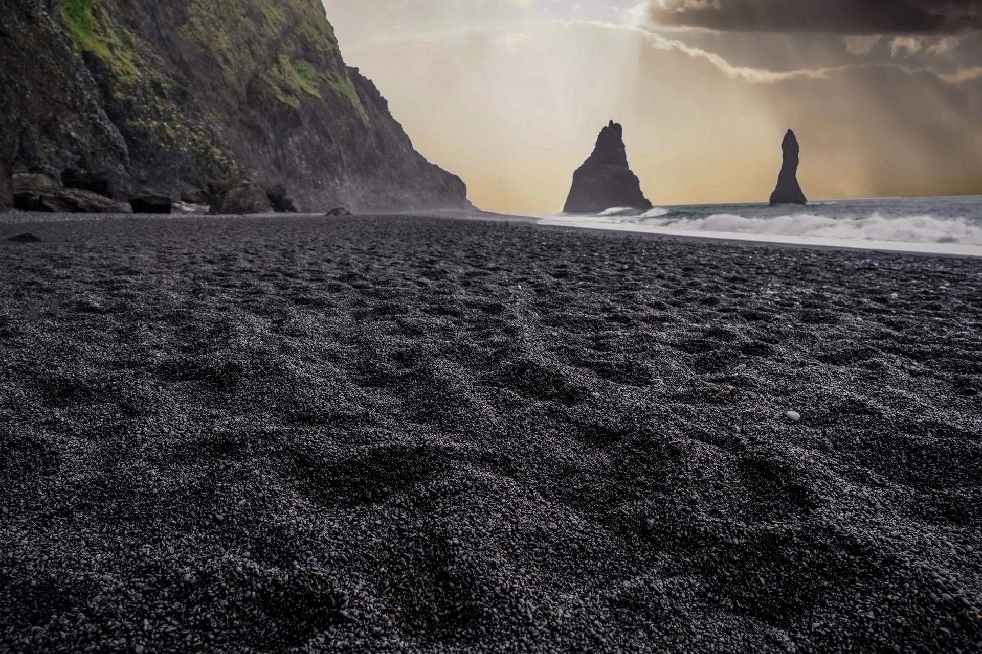 Reynisfjara Black Sand Beach in Iceland during suunset