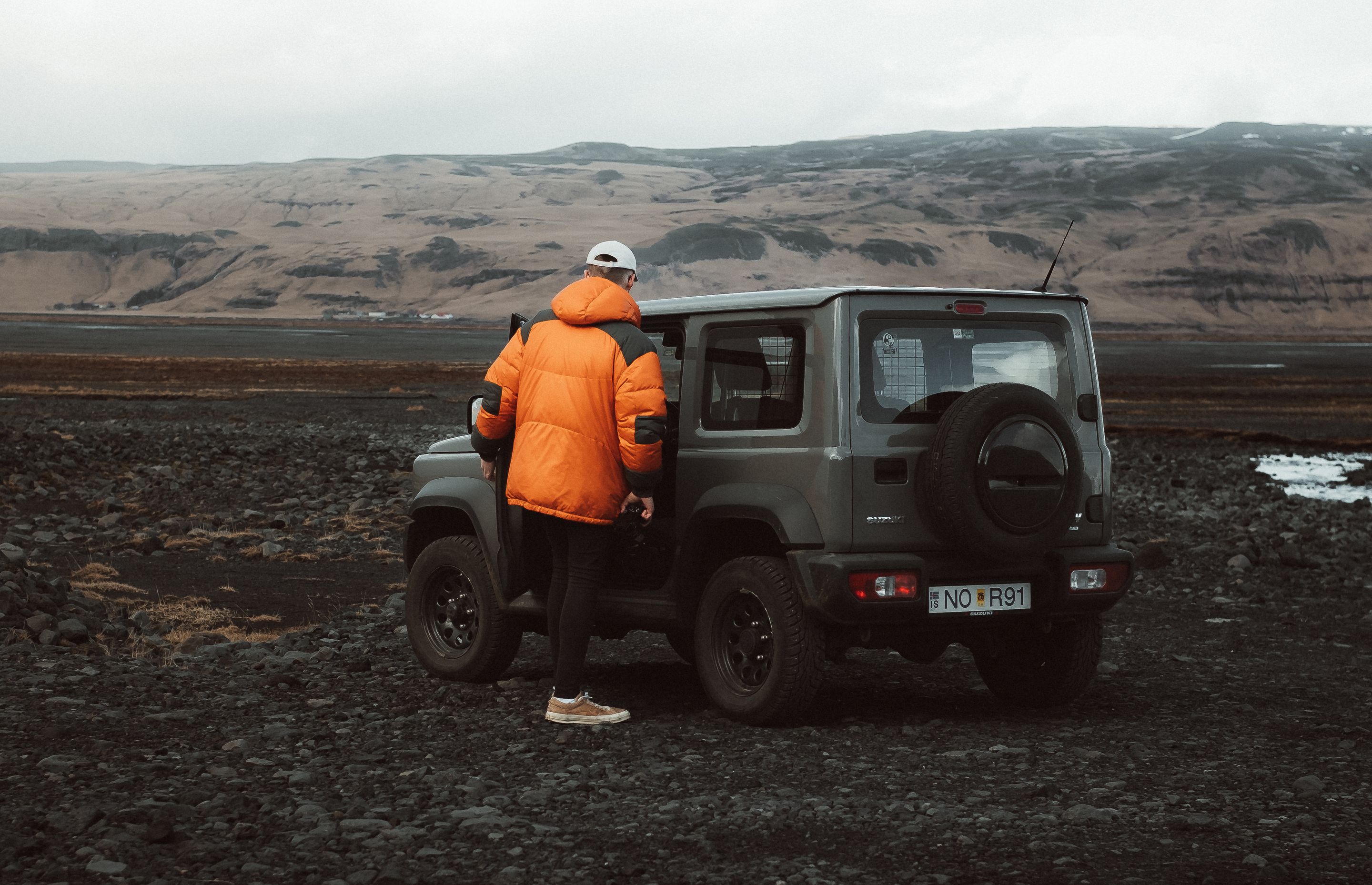 Car overlooking stunning Icelandic landscape