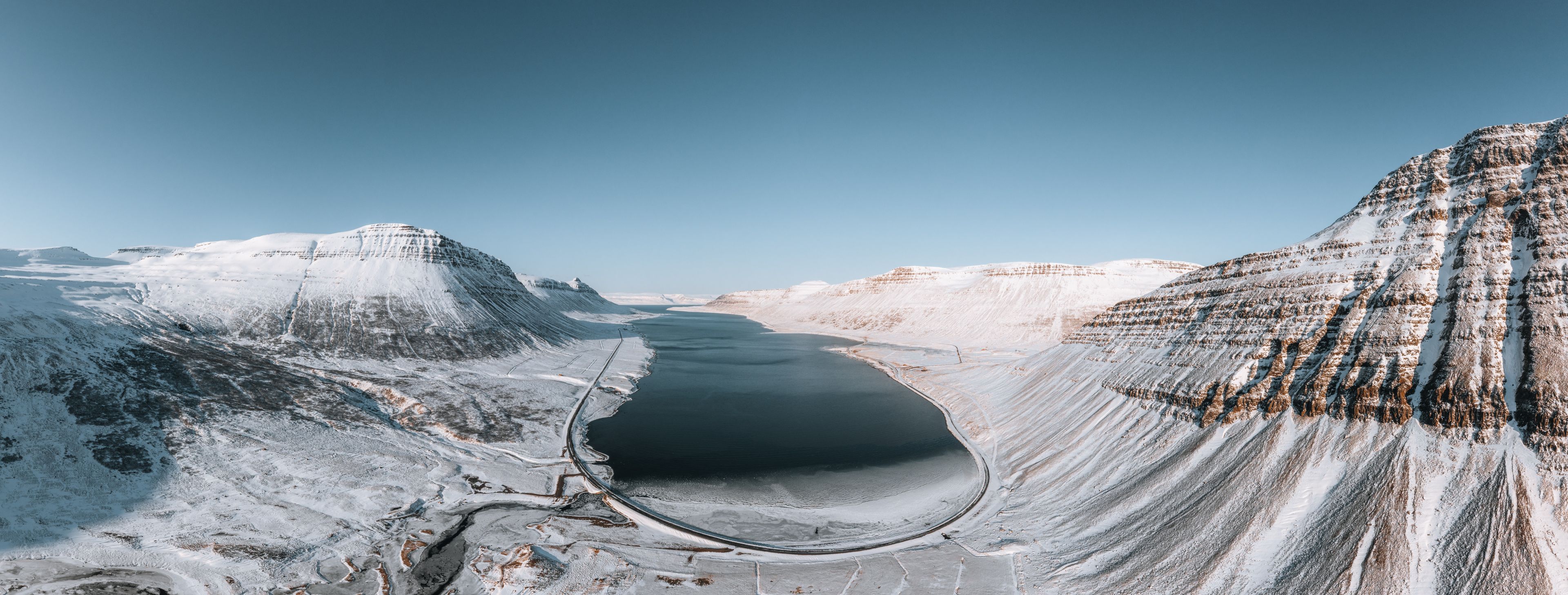 Aerial drone panorama of Westfjords mountains in Iceland during winter