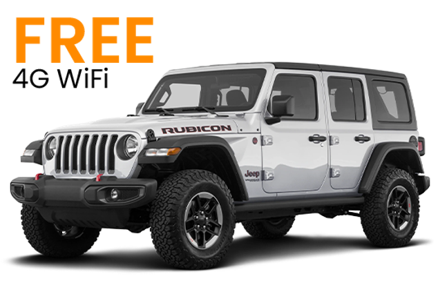  A white Jeep Wrangler Rubicon 4x4 SUV from Go Car Rental Iceland, ready to conquer any Icelandic terrain.