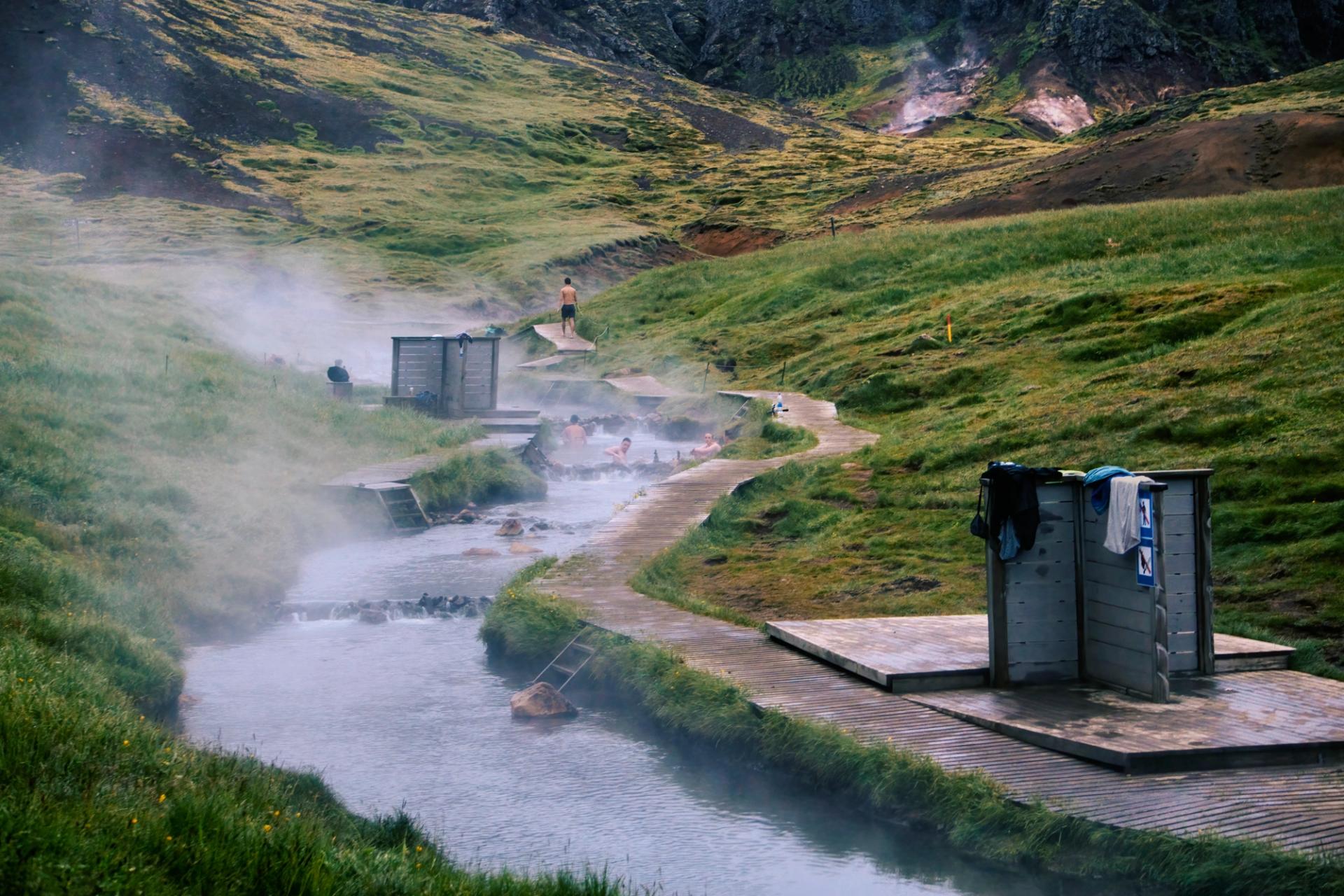 Reykjadalur natural hot springs in Iceland, a steam valley with perfect temperature geothermal water