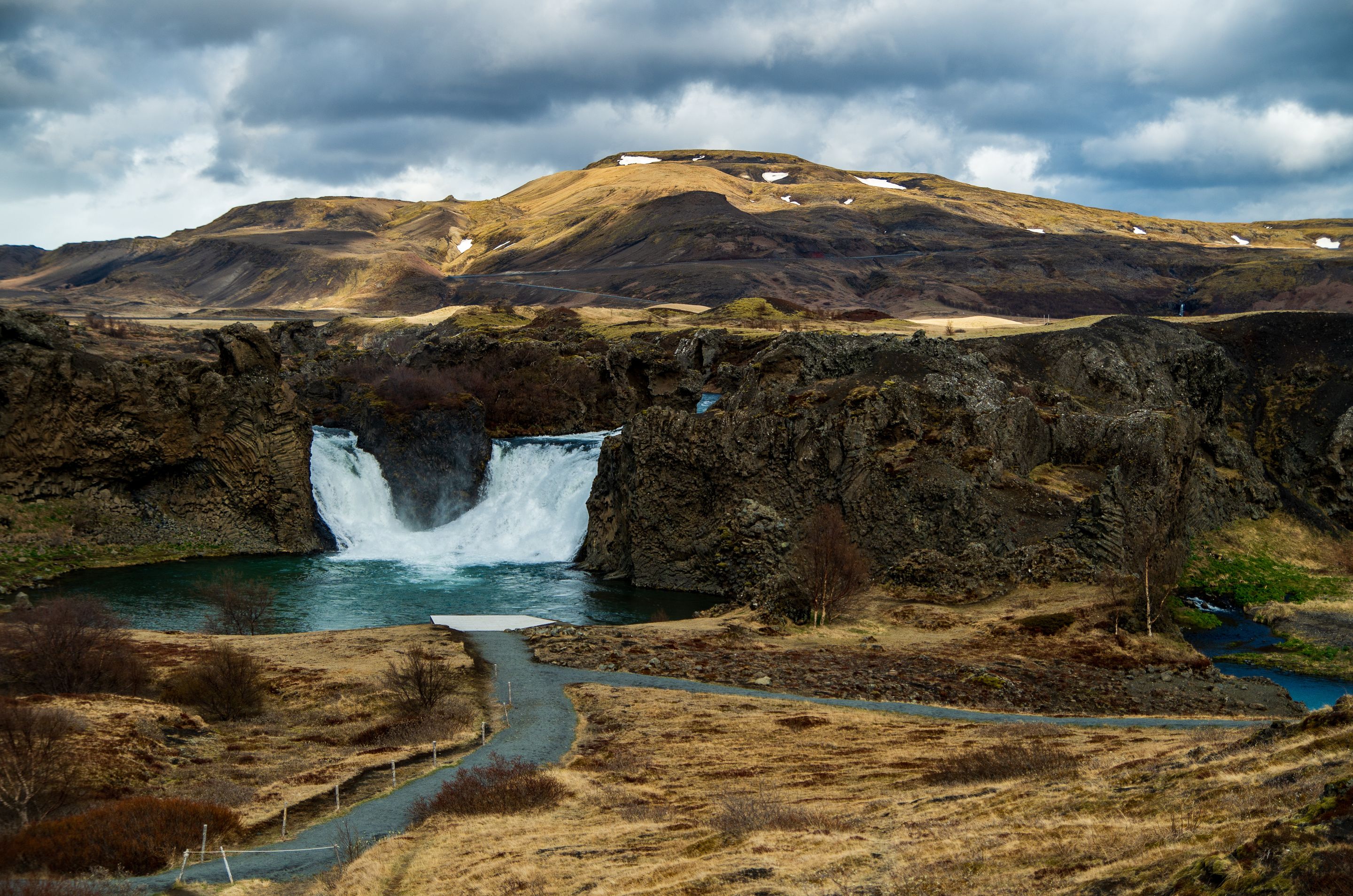 Exploring Hjálparfoss Waterfall, An Oasis For Travelers