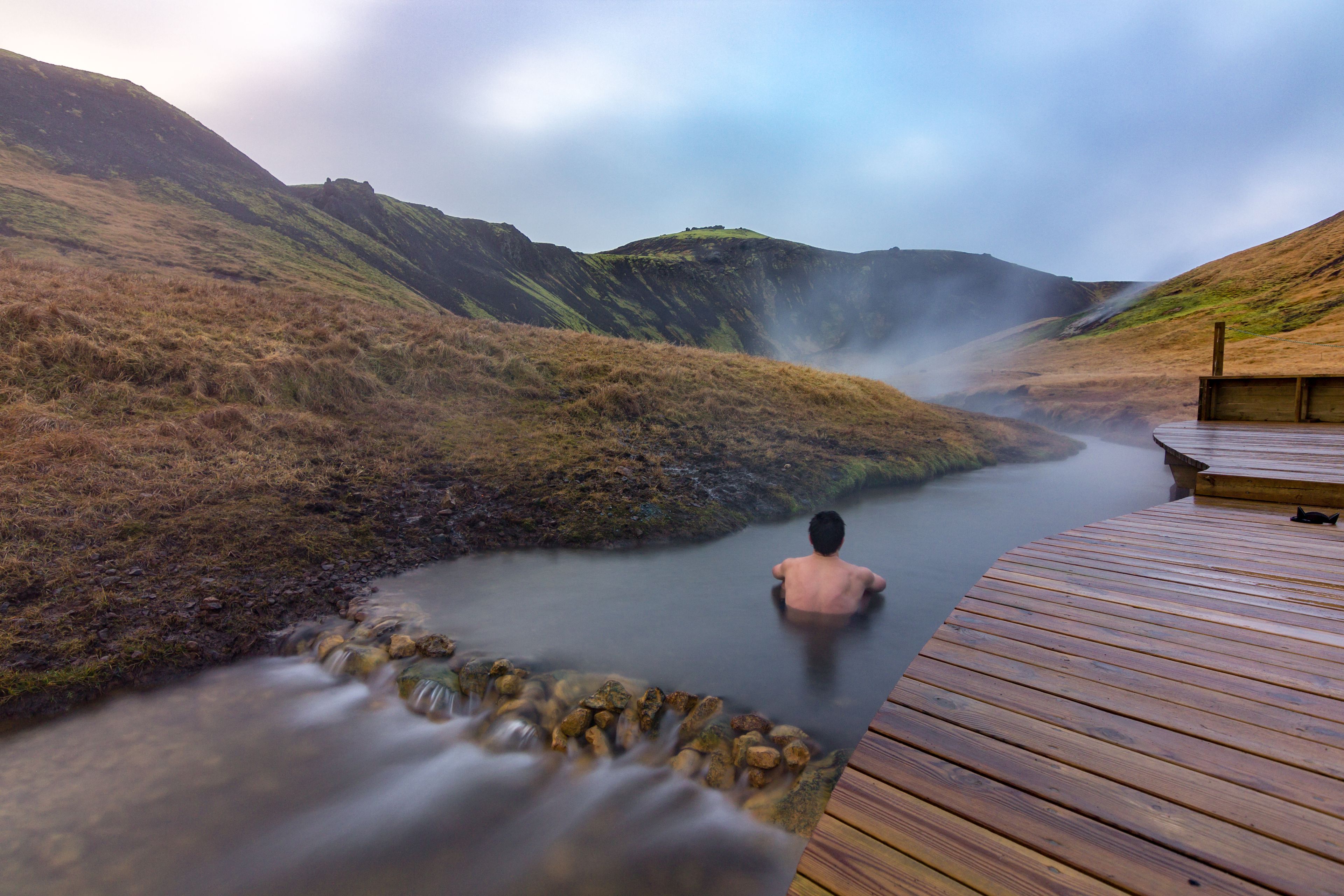 Reykjadalur hot spring, thermal river and its green landscape