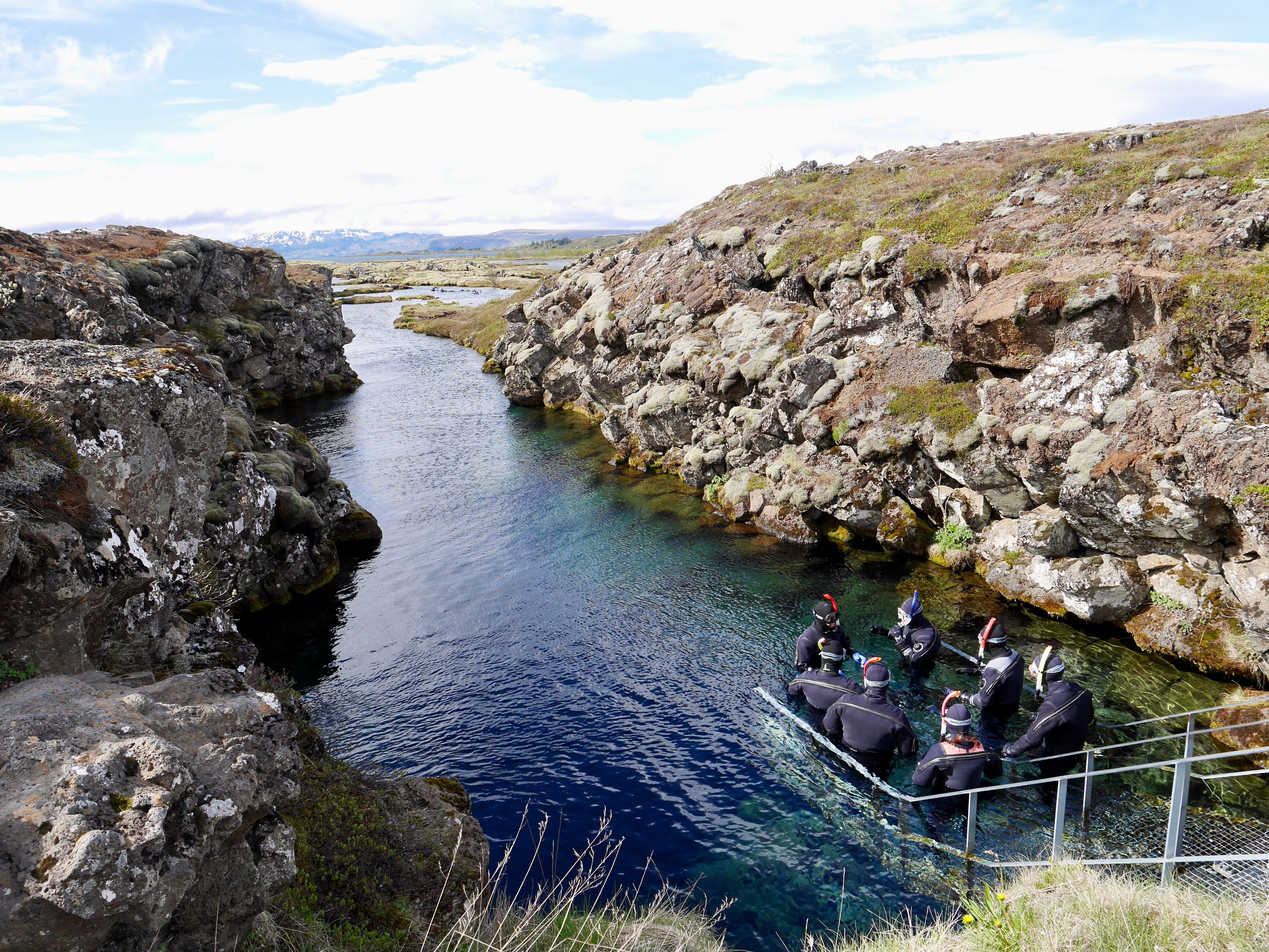 A group of divers about to enter Silfra