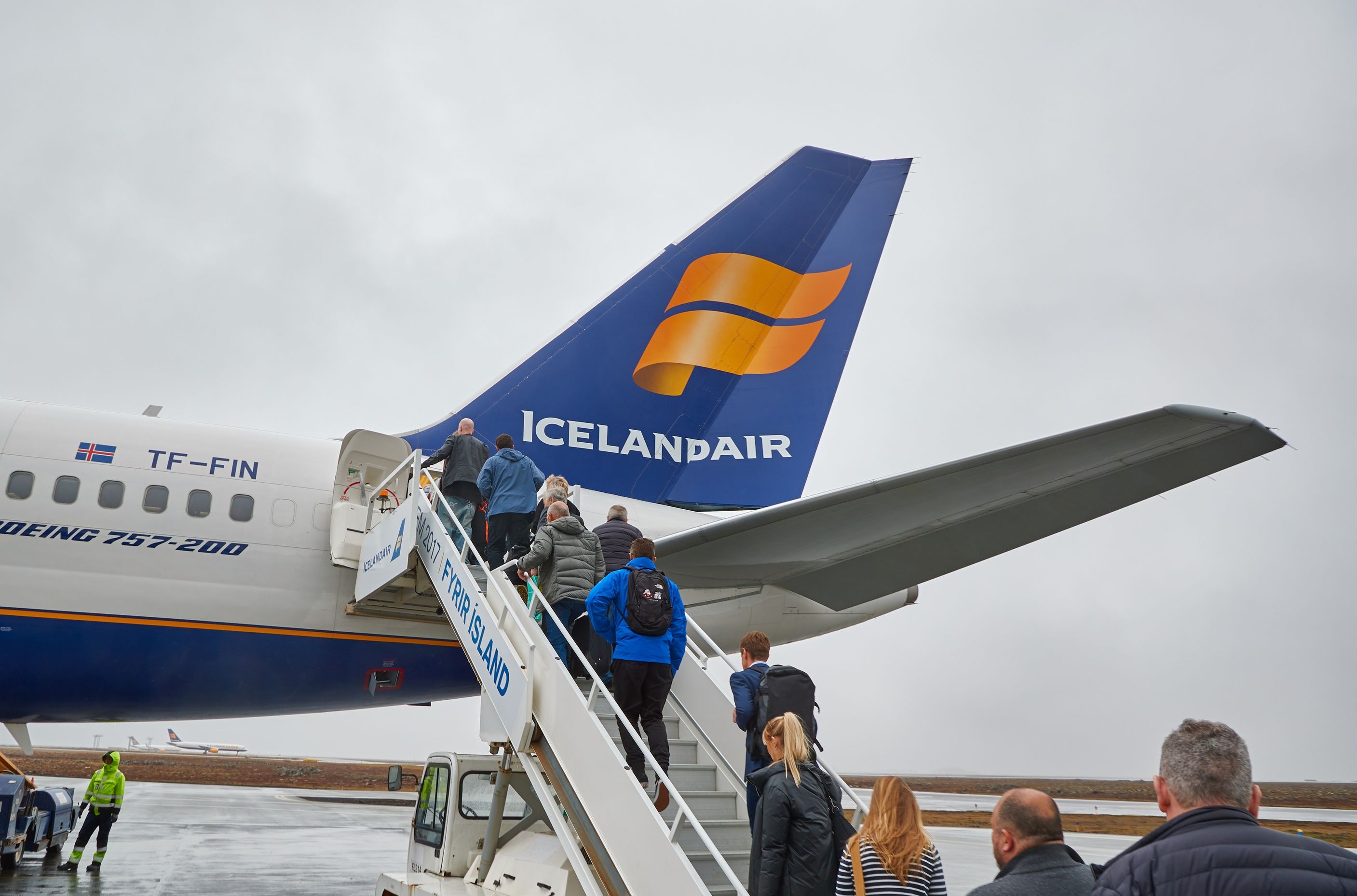 group of people boarding an Icelandic plane at Keflavik airport