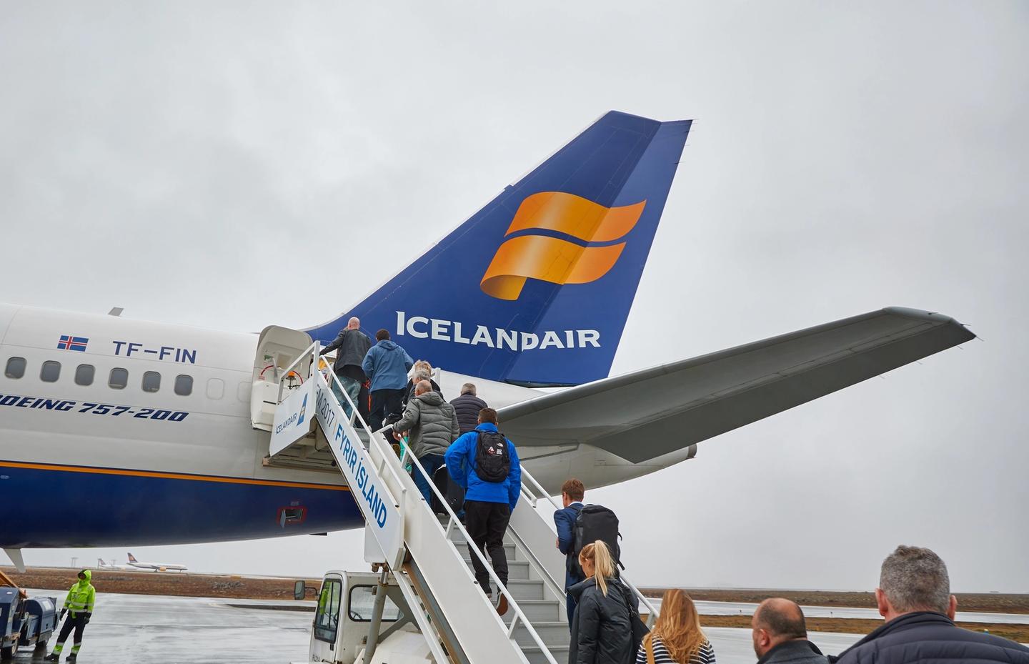 group of people boarding an Icelandic plane at Keflavik airport