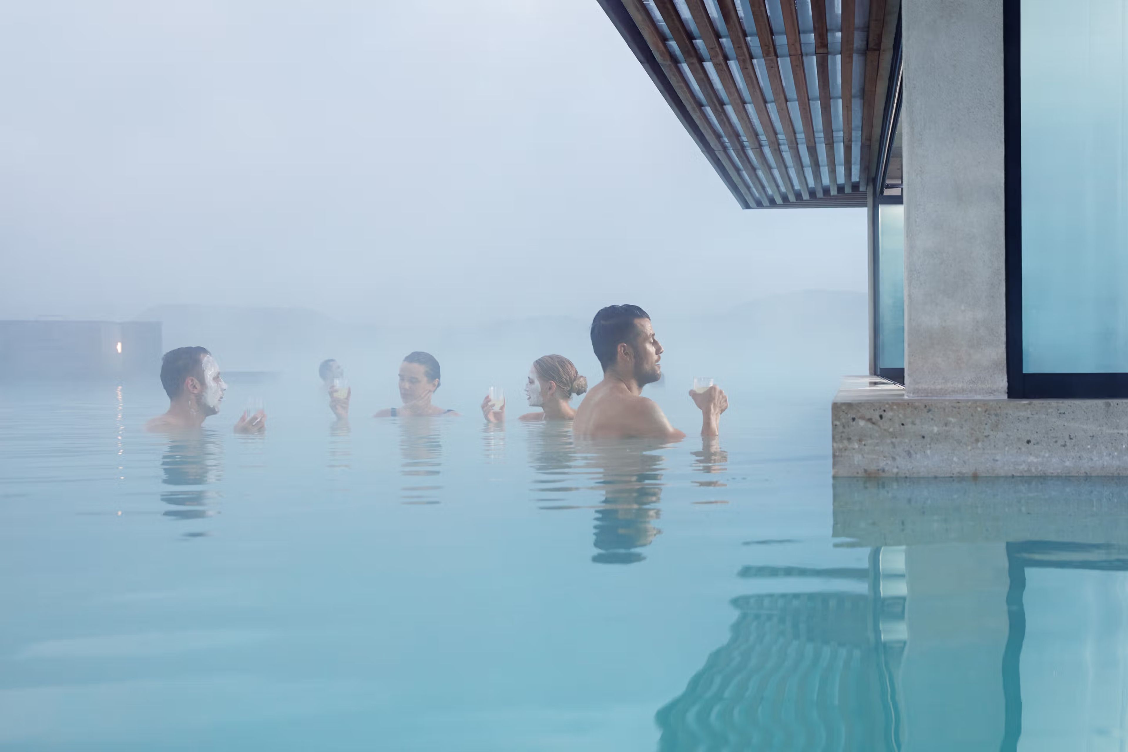 Man having a drink at the Blue Lagoon's in-water bar