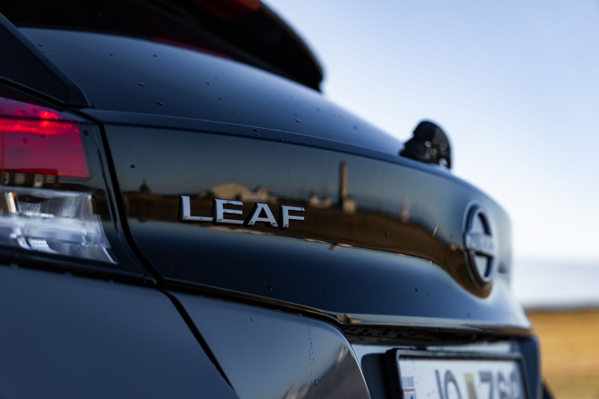 Nissan Leaf logo on the renal car from go car rental
