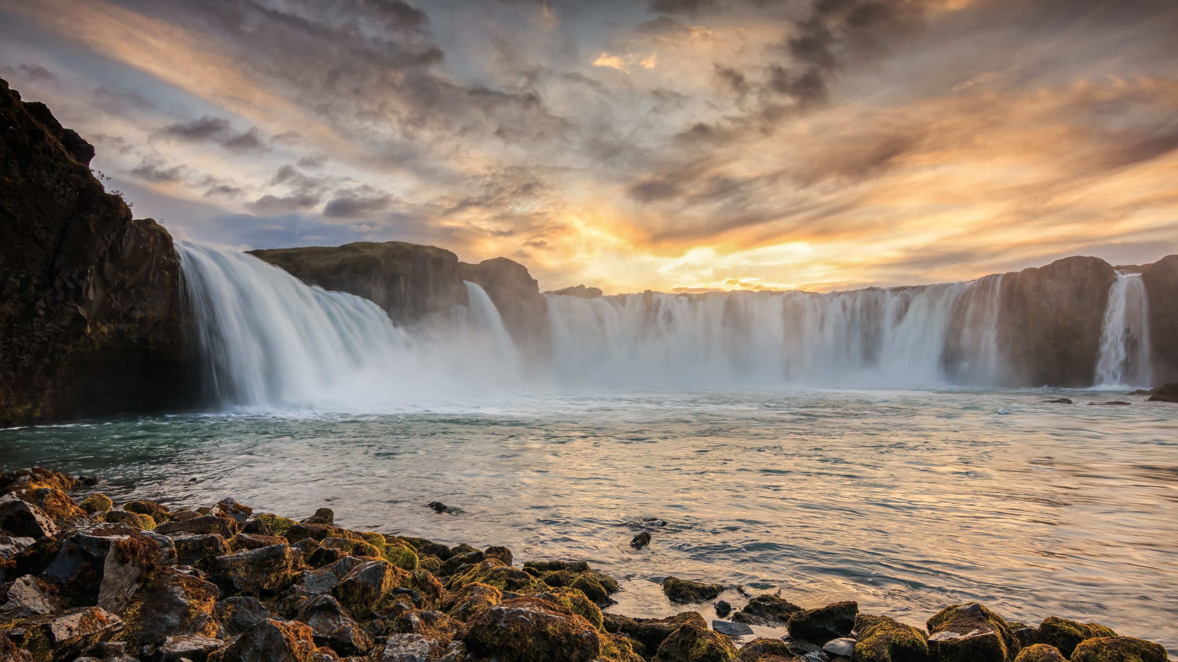 big waterfall at sunrise