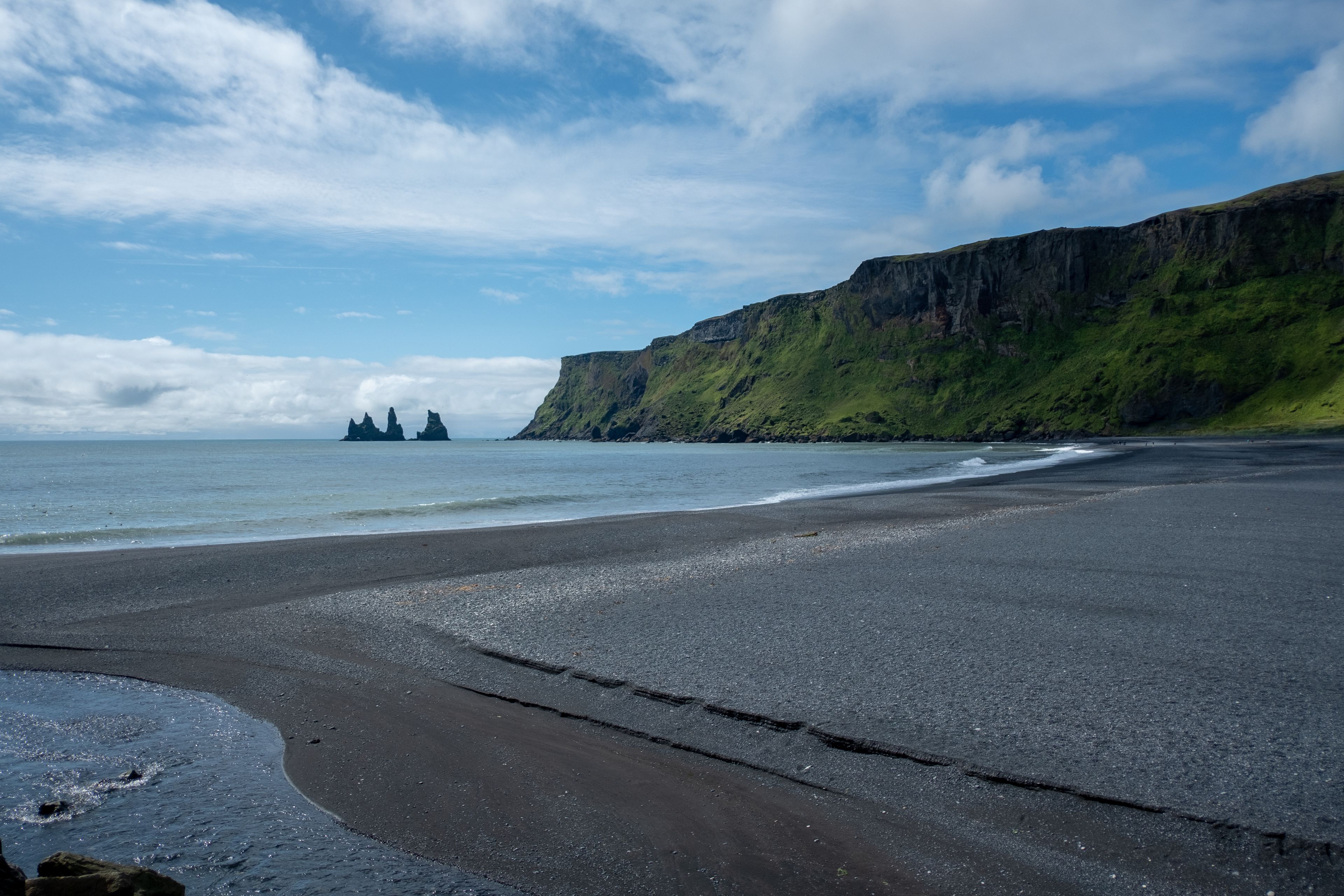In the westfjord, the pretty Breidavik Beach with its black sand