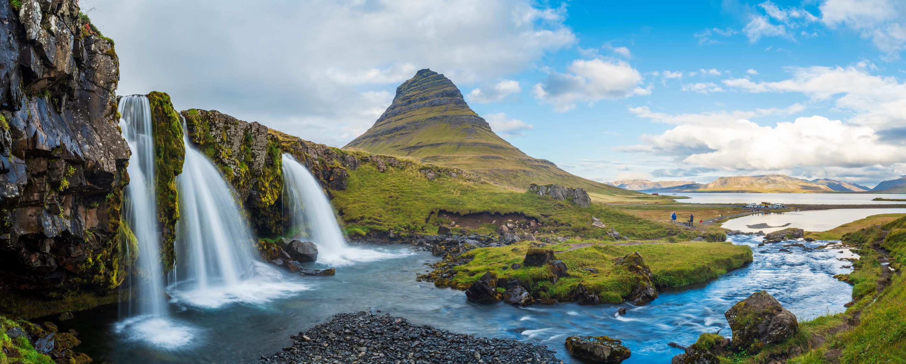 mt kirkjufell and kirkjufellsfoss waterfall in west iceland, most photographed mountain in north shore