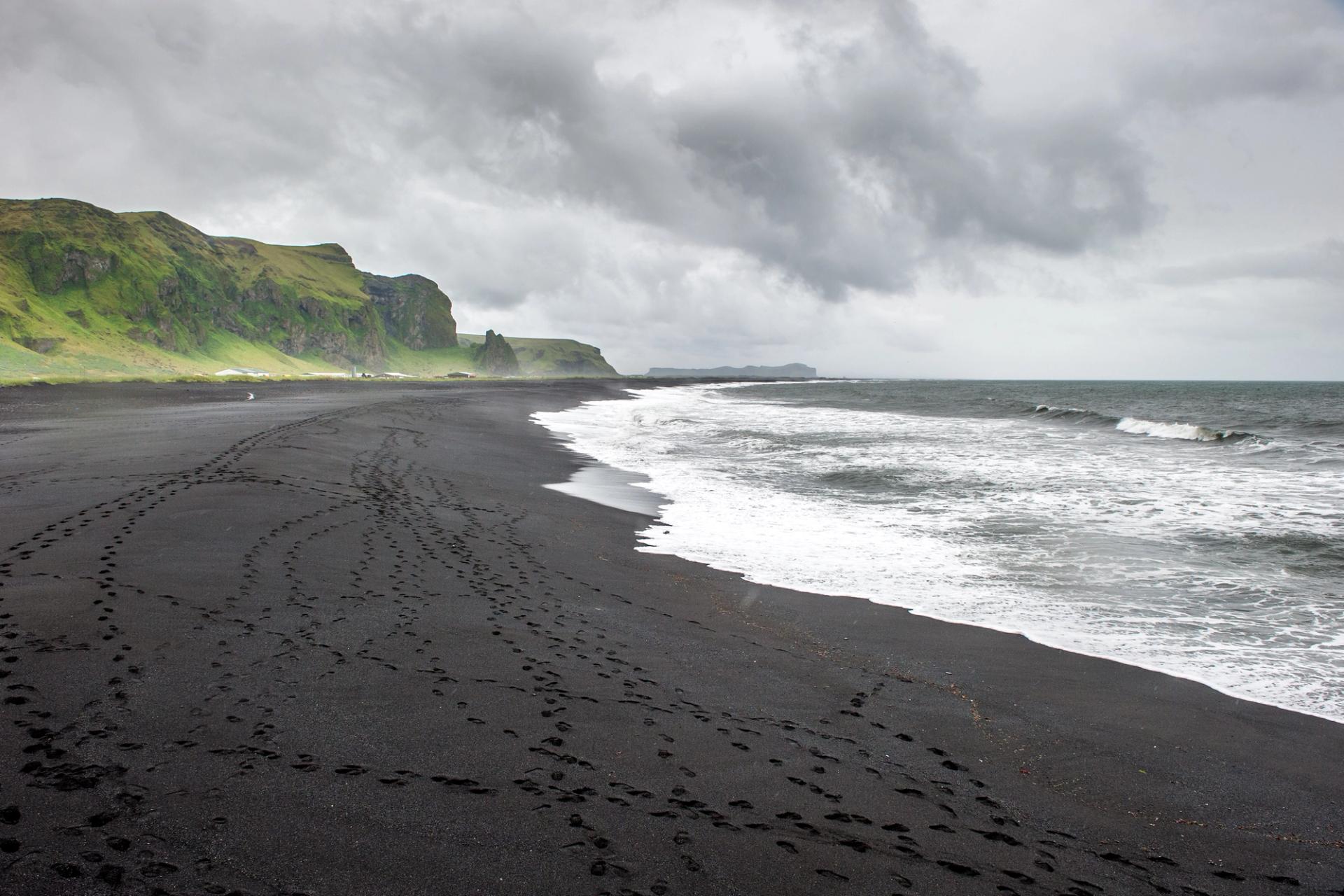 Marvel at the surreal beauty of Iceland's black sand beaches during your self-drive tour.