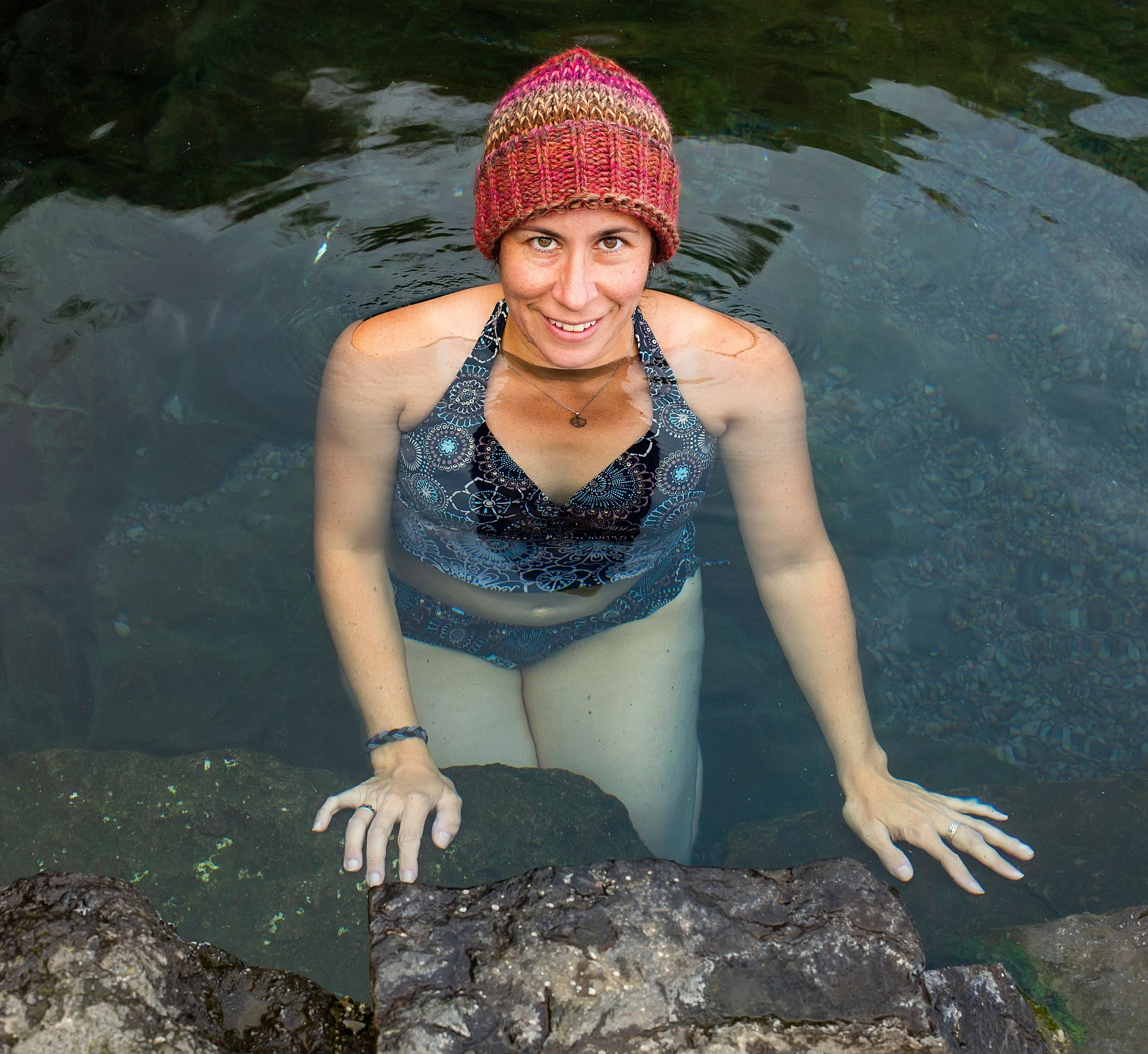 Woman bathing on Hellulaug Hot Spring