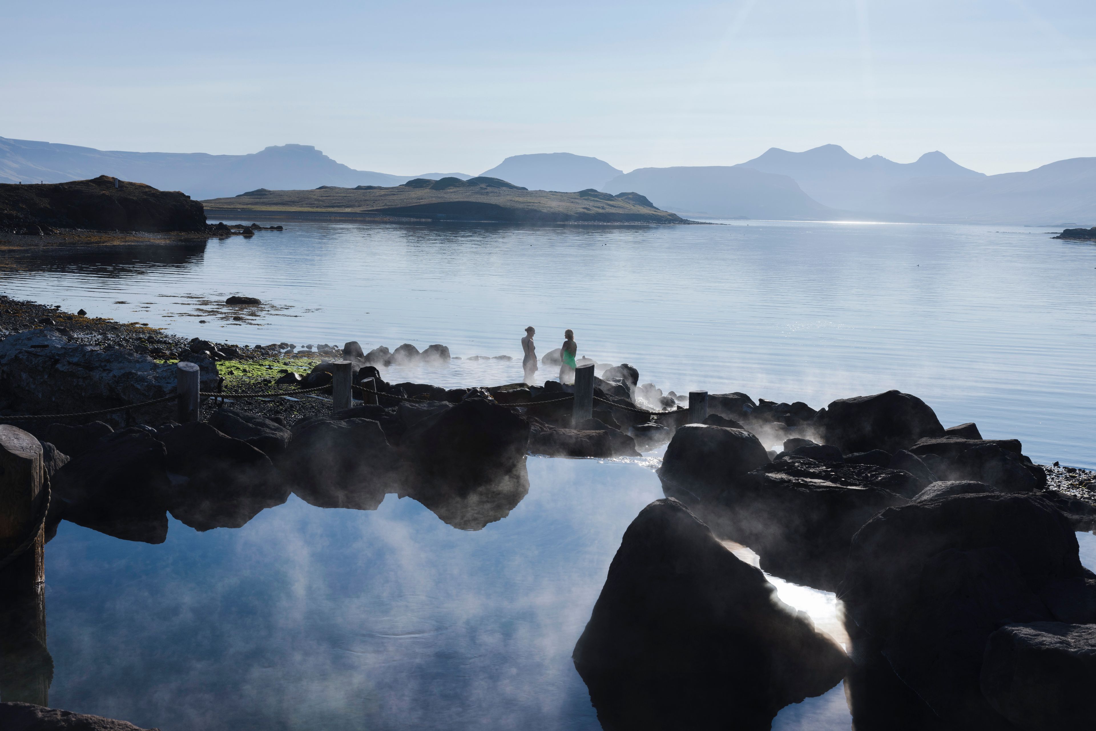 People at Hvammsvík Hot Springs