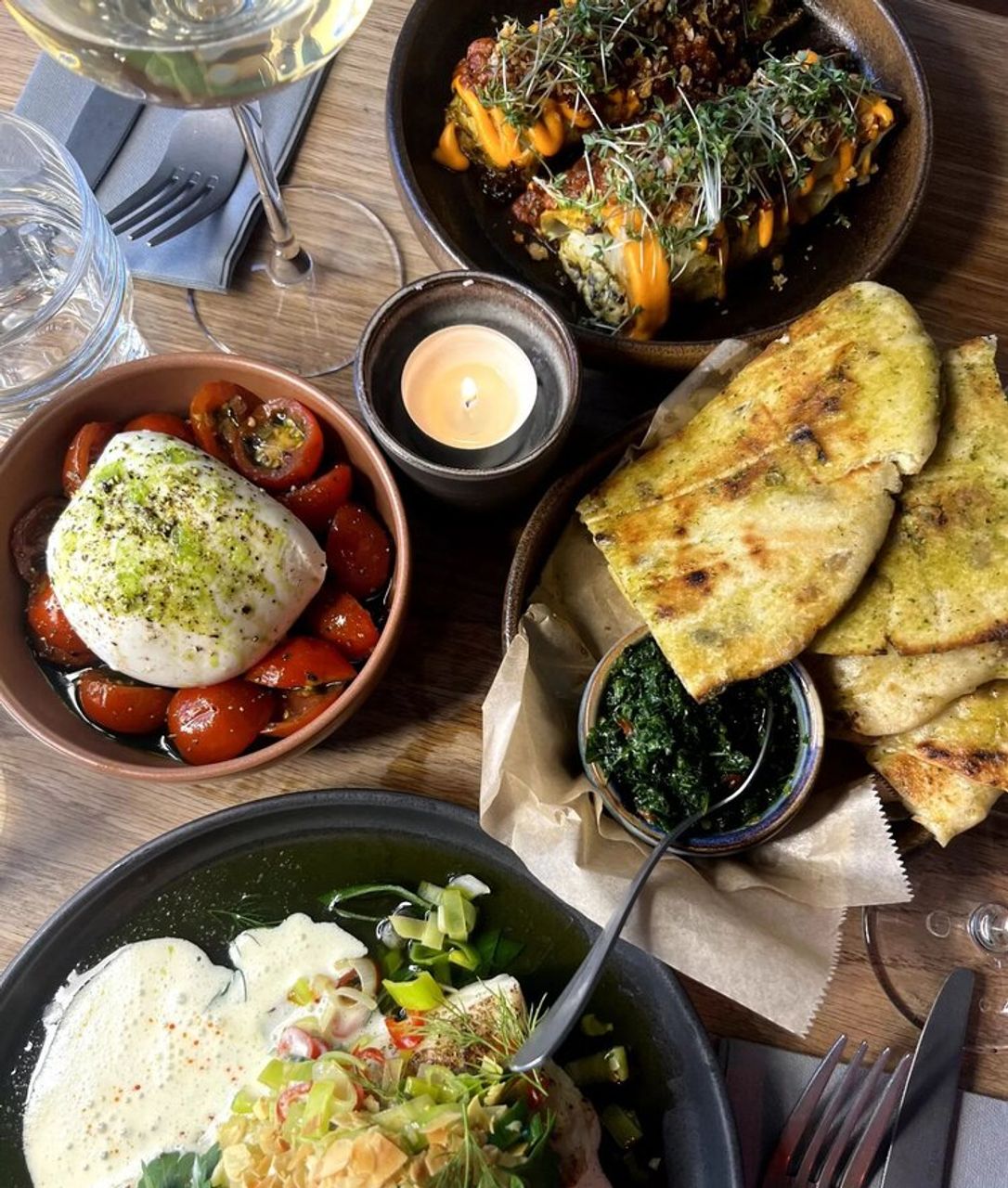 assortment of 4 dishes at Mat Bar Restaurant 