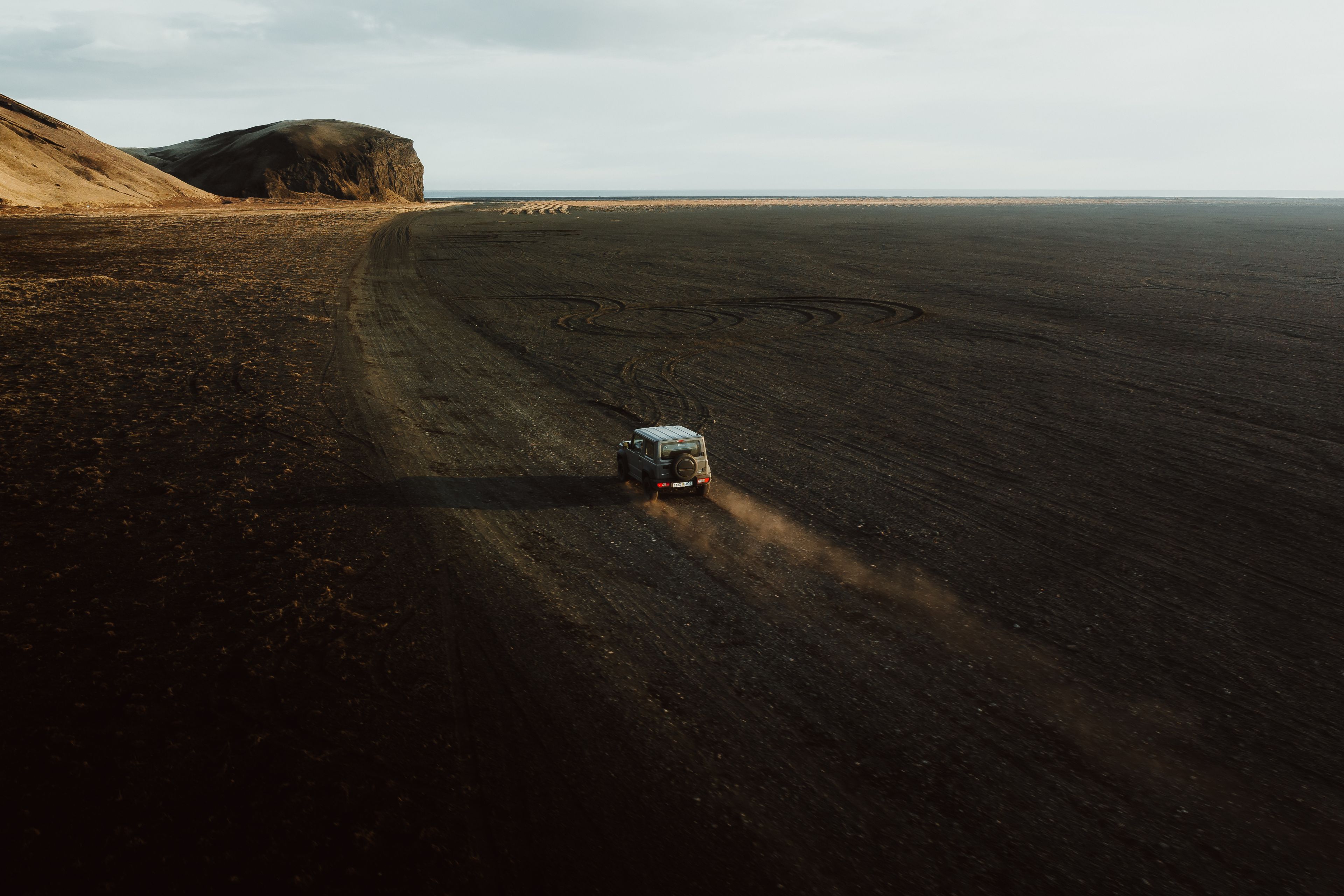 4x4 car navigating through rough Icelandic terrain