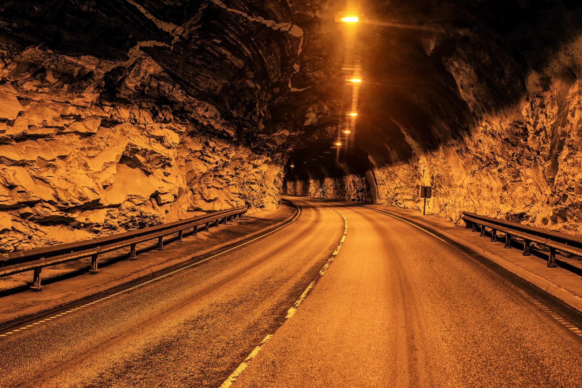 Rental car tunnel in mountain at north Iceland