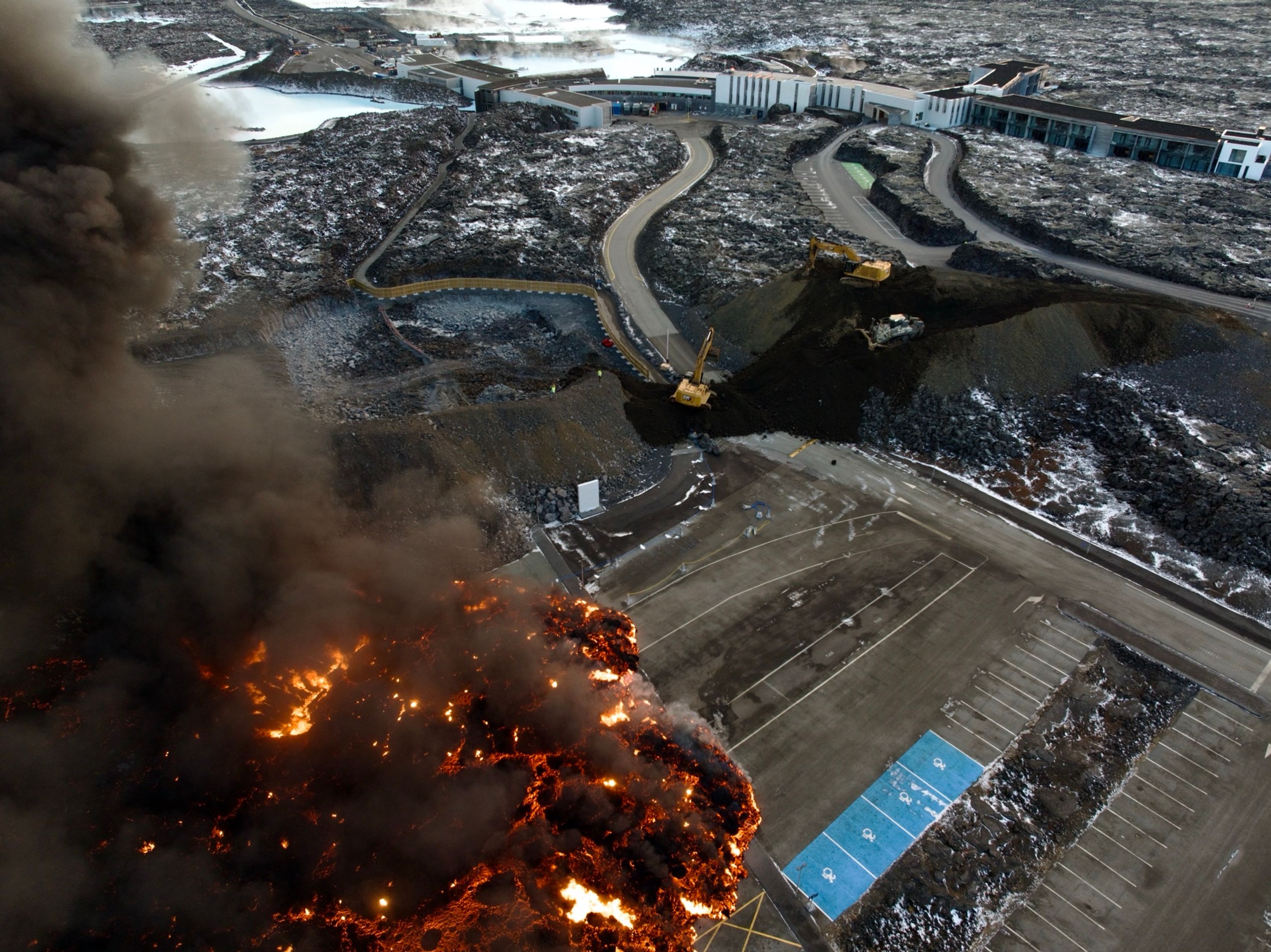 Lava advancing and destroying the Blue Lagoon's parking