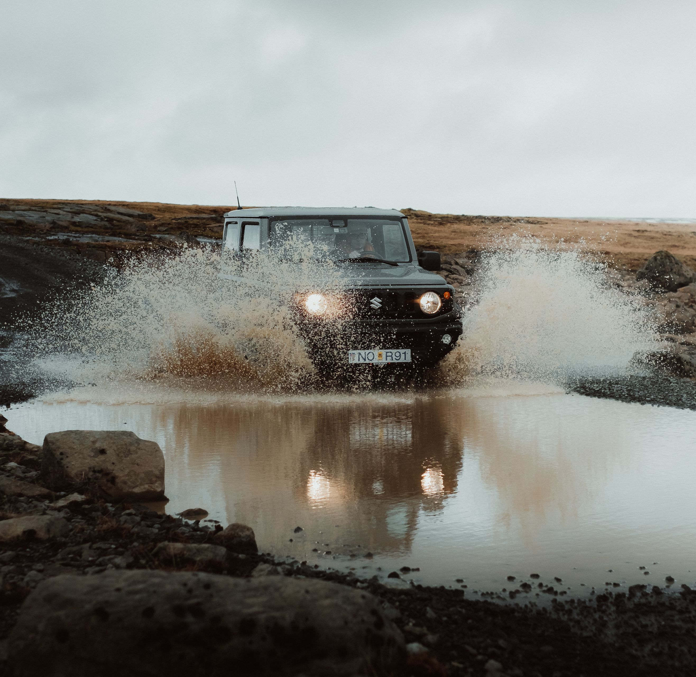 Suzuki Jimny river crossing in F-road in Iceland 