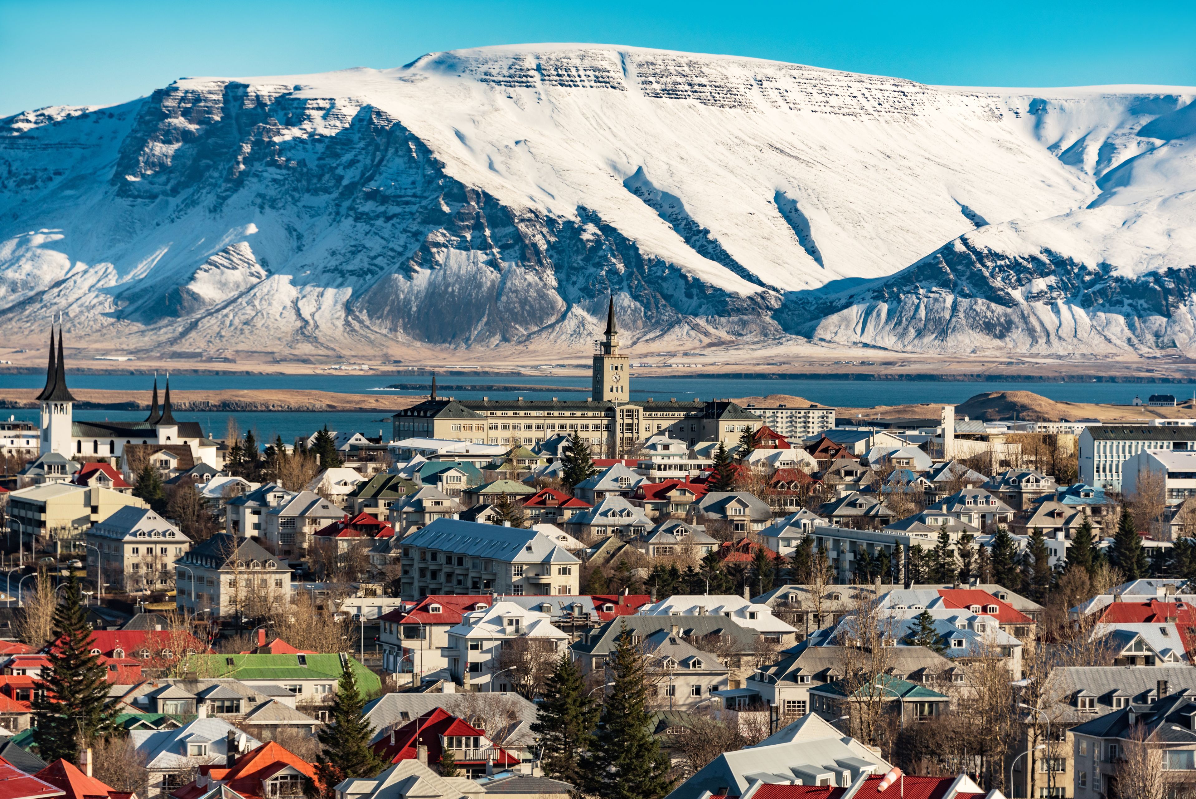 Reykjavik in winter with snowy mountains in the background