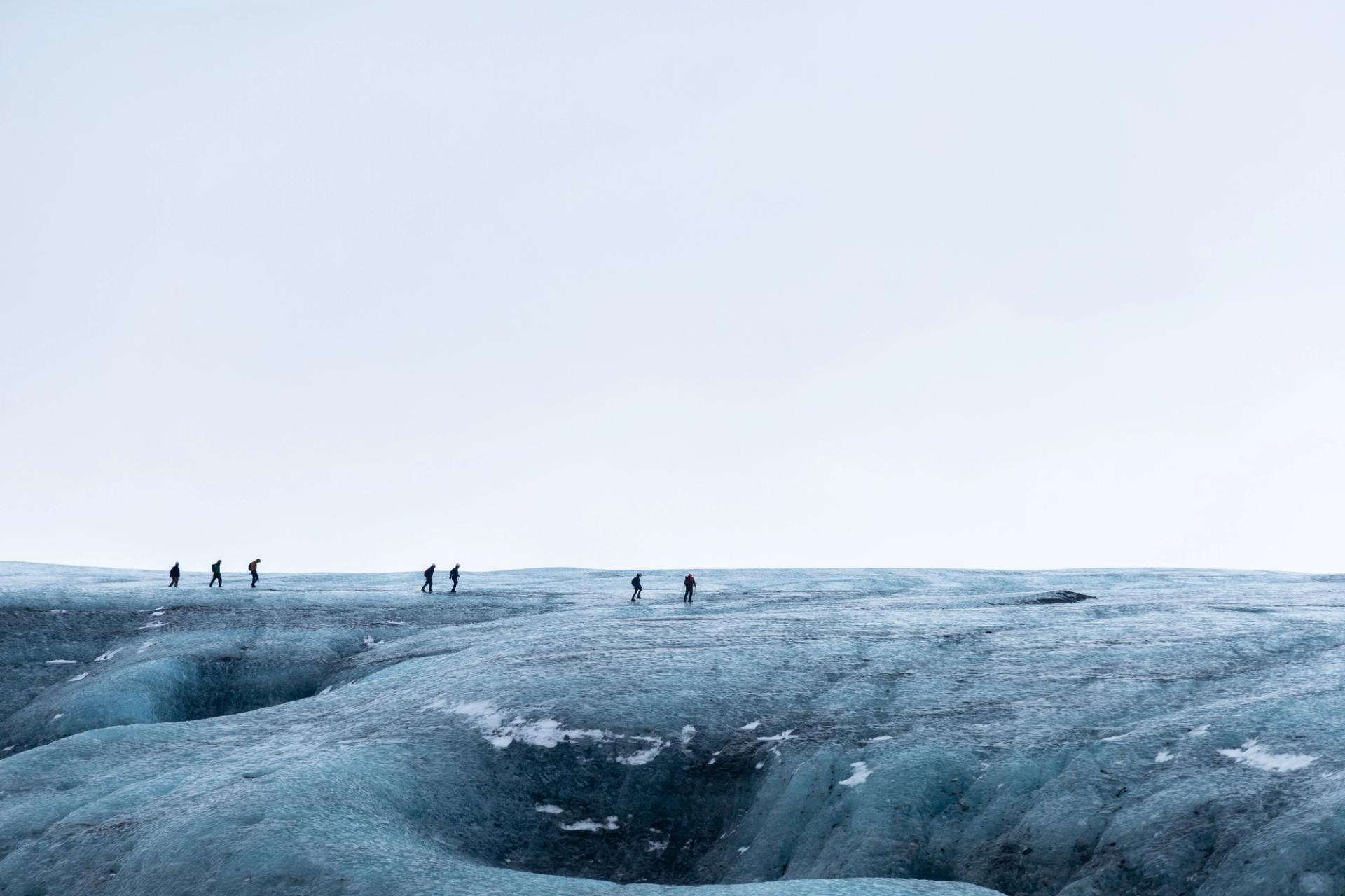 People walking on a Vatnajökull glacier in Iceland