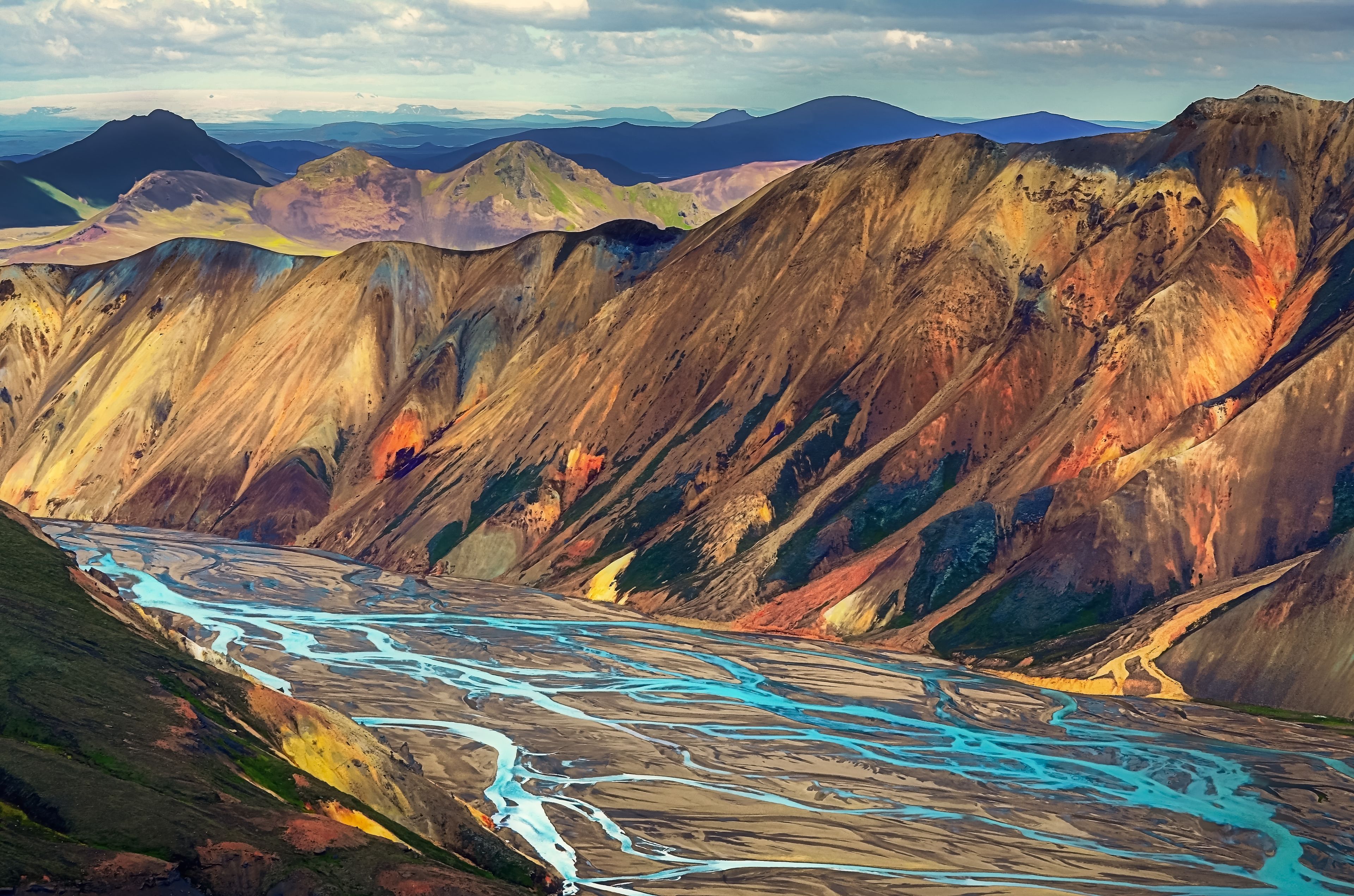 View of Landmannalaugar colorful volcanic mountains and river, Iceland