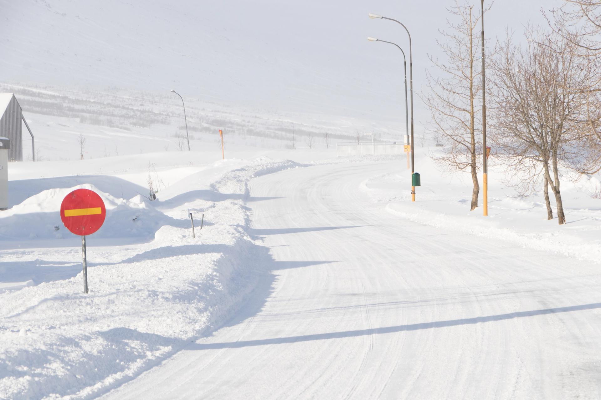 Clear road covered in snow during winter in Iceland