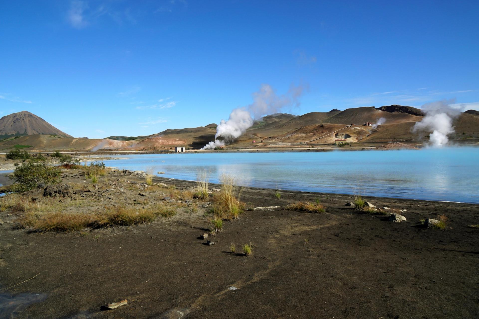 Visiting Lake Myvatn in iceland with volcanic activity in the background