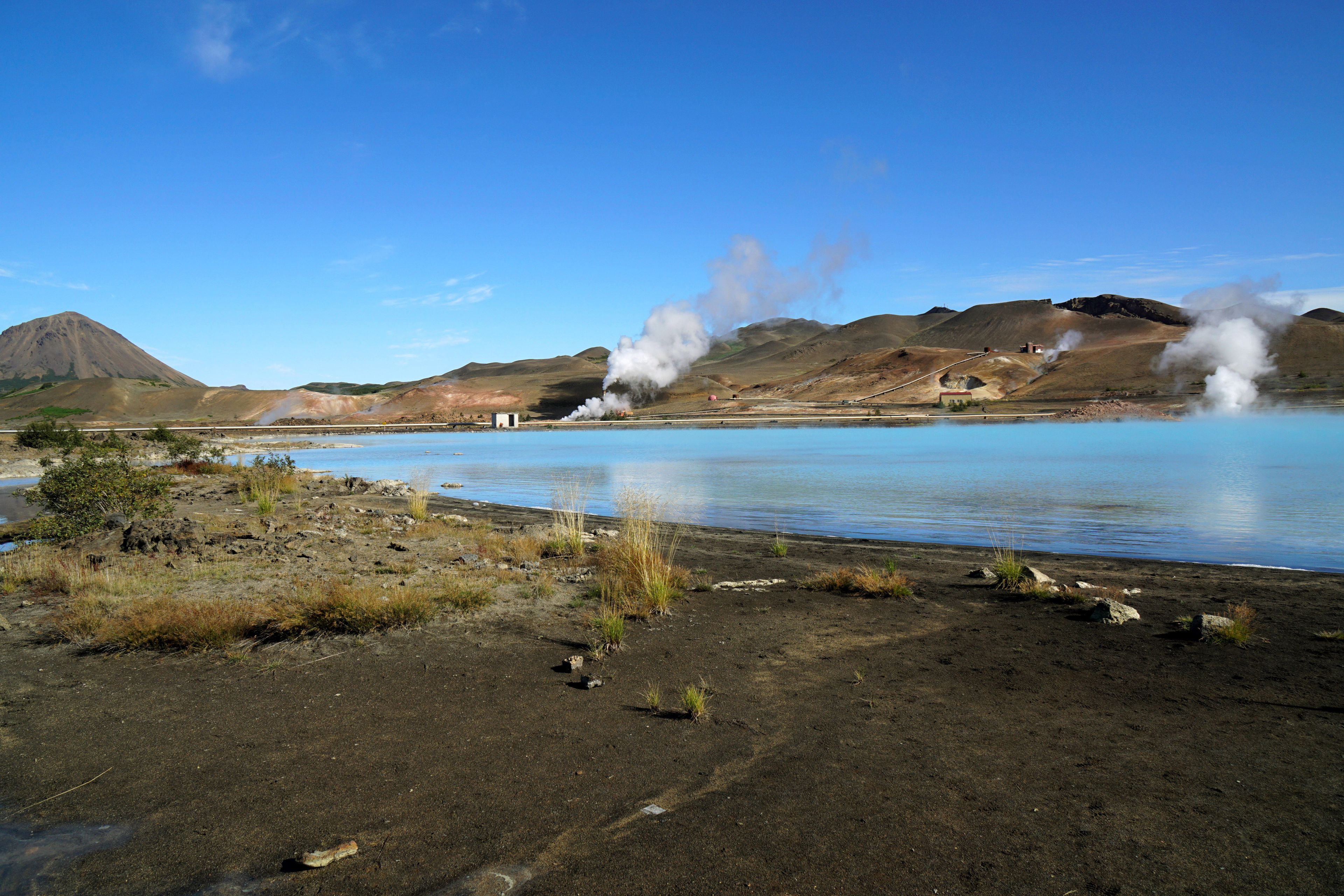 Visiting Lake Myvatn in iceland with volcanic activity in the background