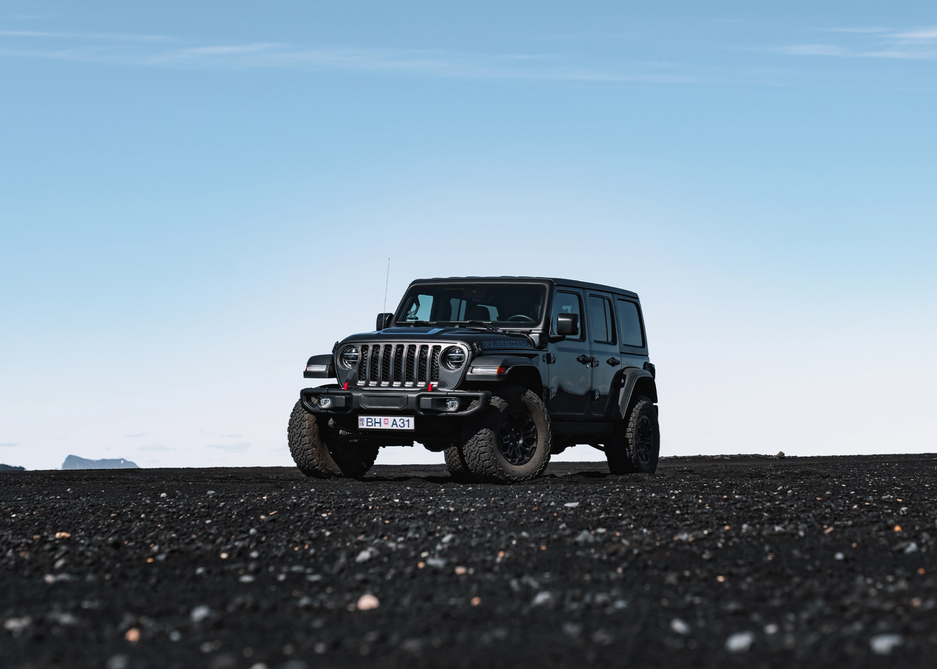 F-Road Luxury - A Jeep Wrangler Rubicon 4x4 SUV from Go Car Rental exploring the untamed beauty of Iceland.