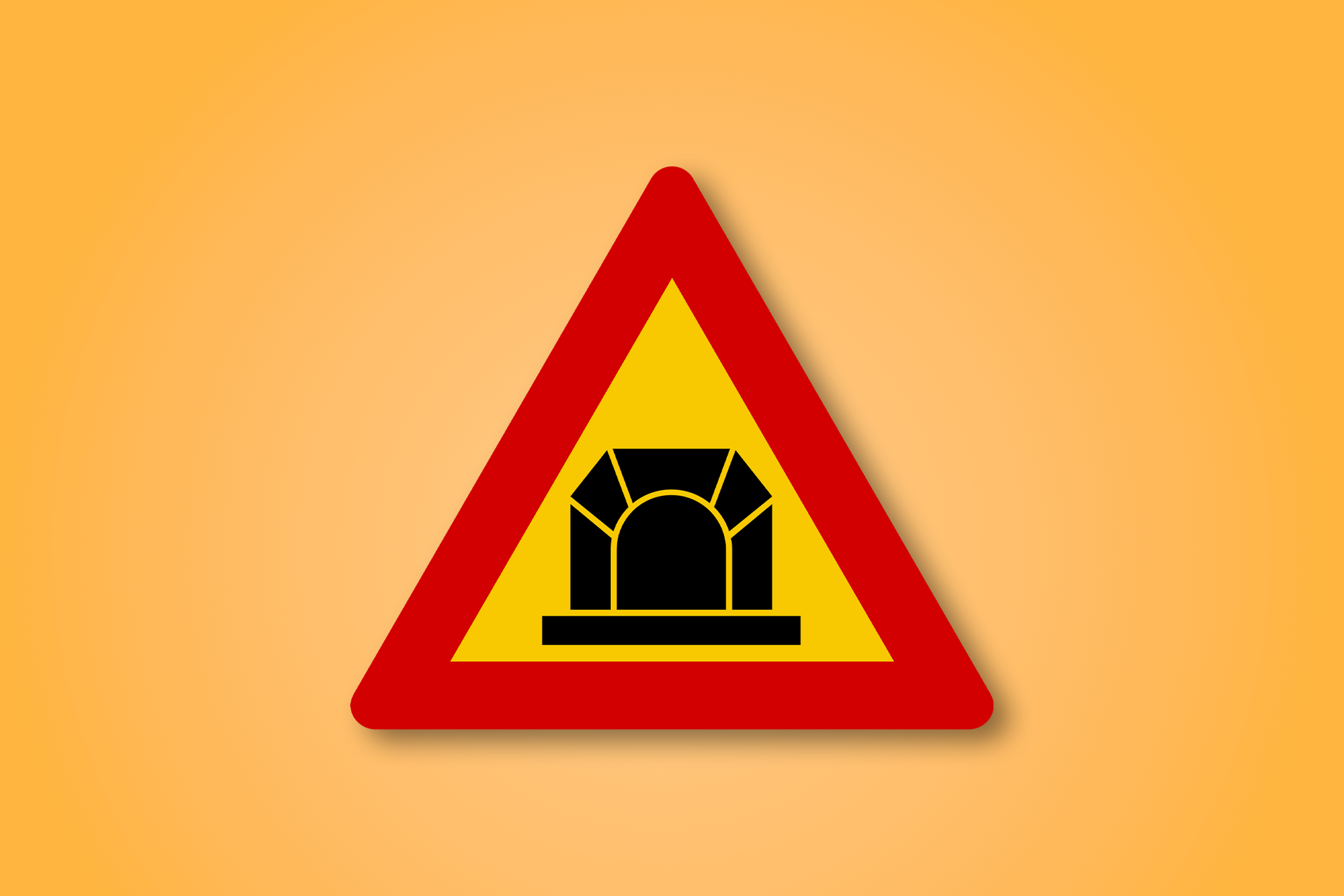 一块红色和黄色的三角形路标，中间有一个隧道。这个路标表示前方是隧道。