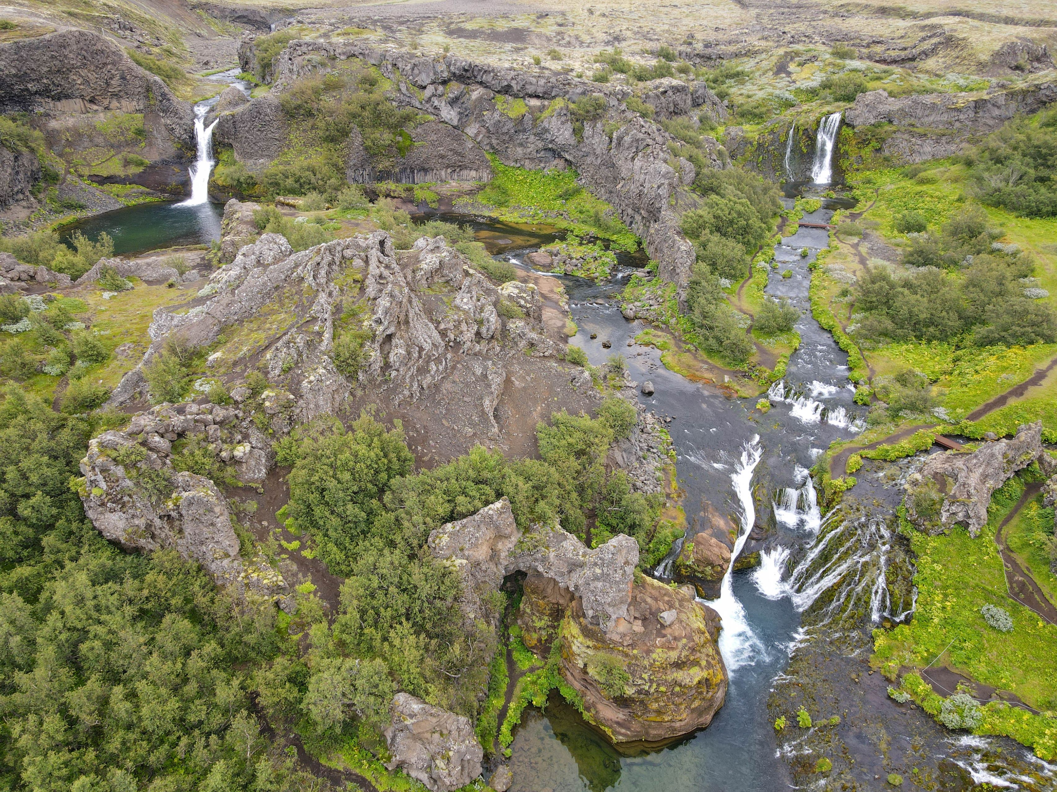 Drone view at the waterfalls of Gjain in Iceland