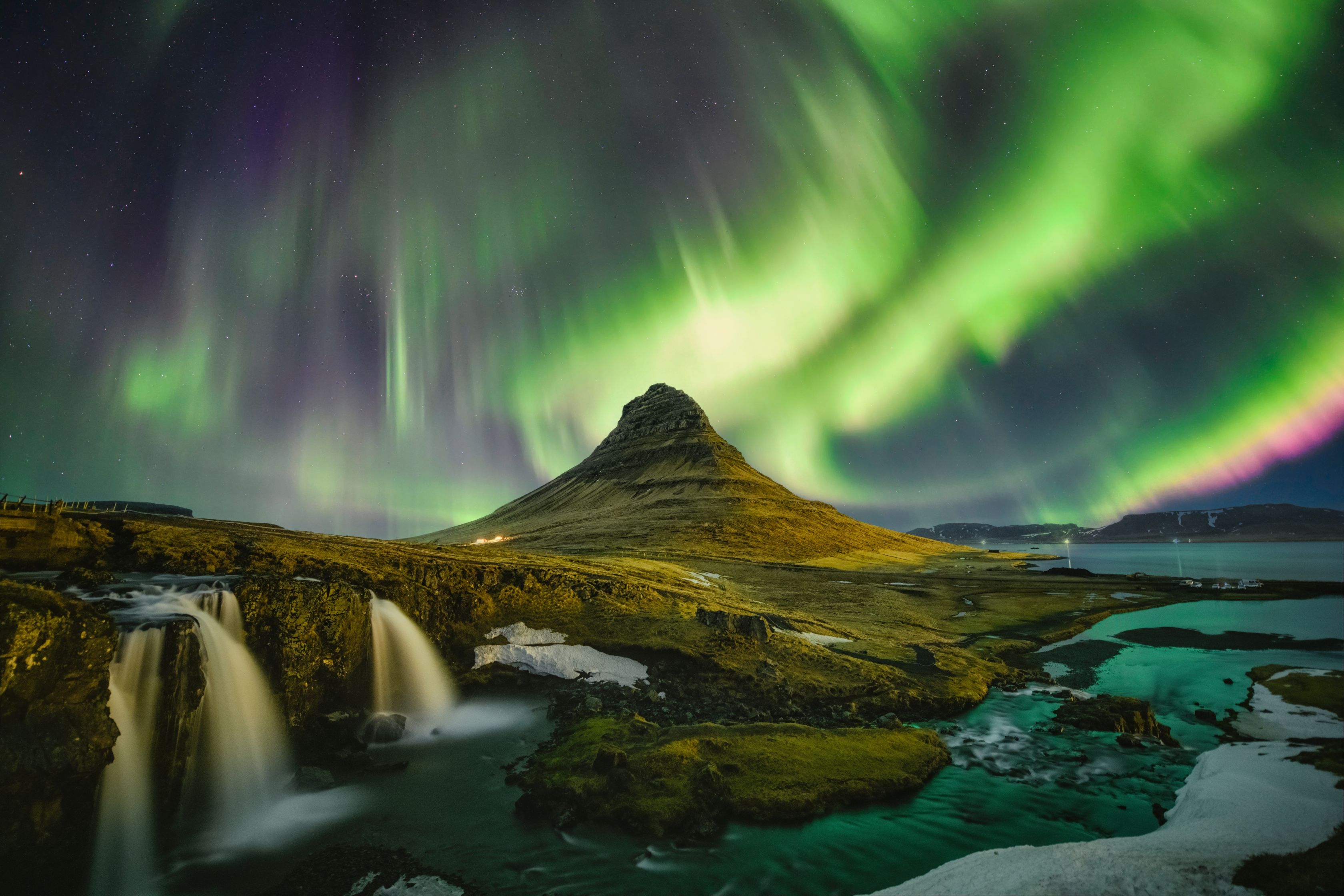 Kirkjufell in iceland with northern lights in winter