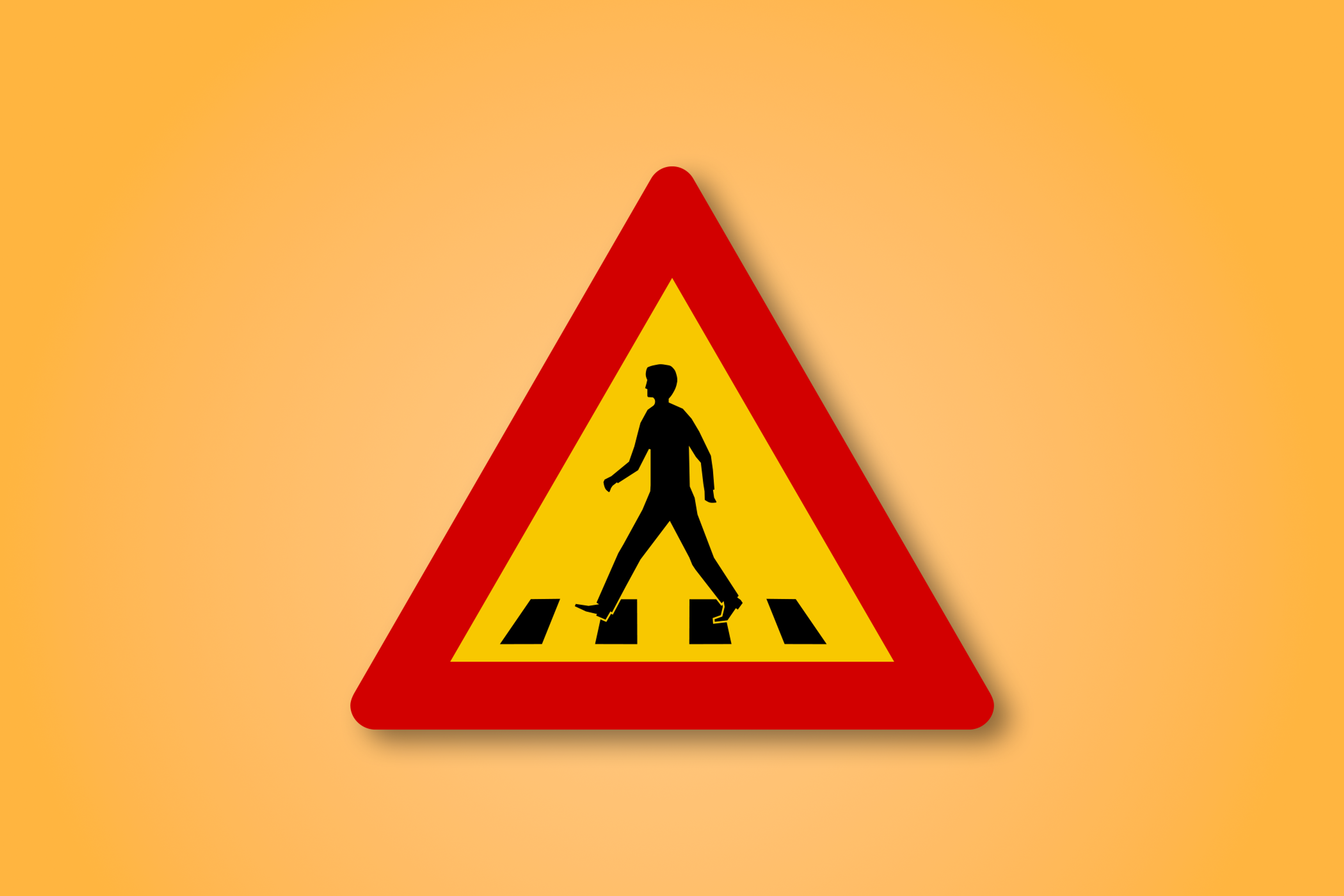Red and yellow triangle road sign with a men walking in the middle. This road sign means Zebra Crossing ahead