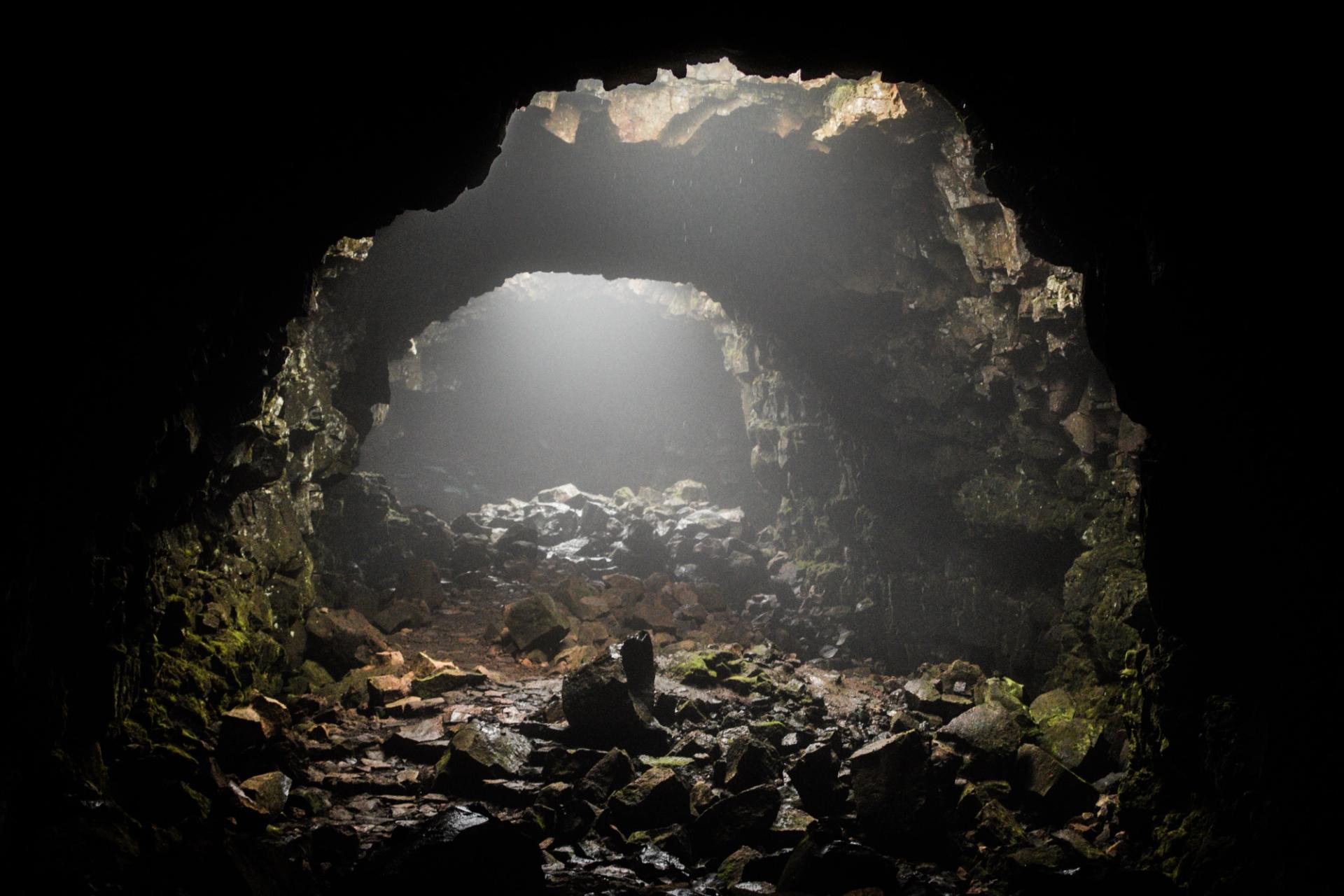 Illuminated interior of Raufarhólshellir lava tube in South Iceland.