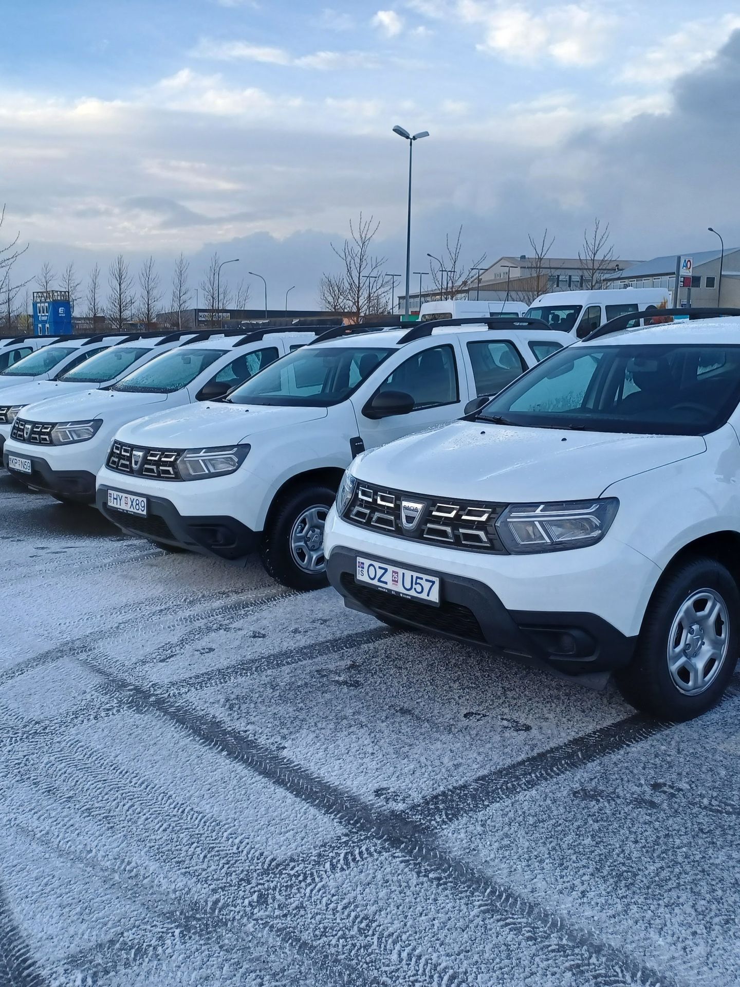 White Dacia Duster 4x4 rental cars parked in Iceland