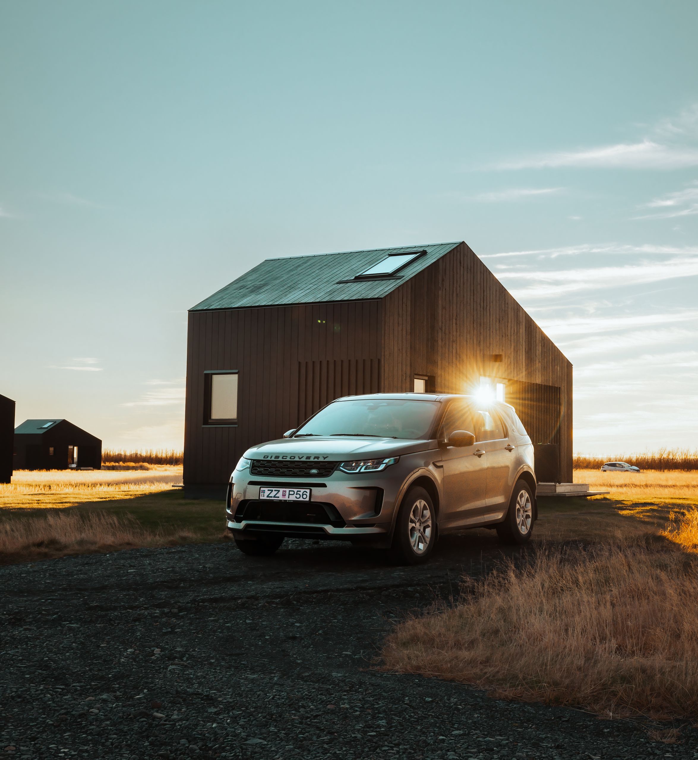 Land Rover Discovery Sport parked during Icelandic sunset