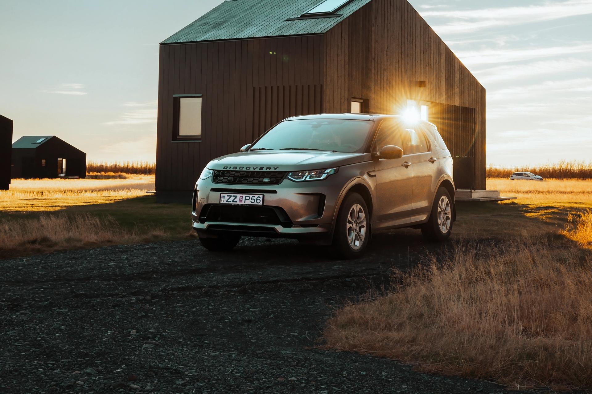 Land Rover Discovery Sport parked during Icelandic sunset