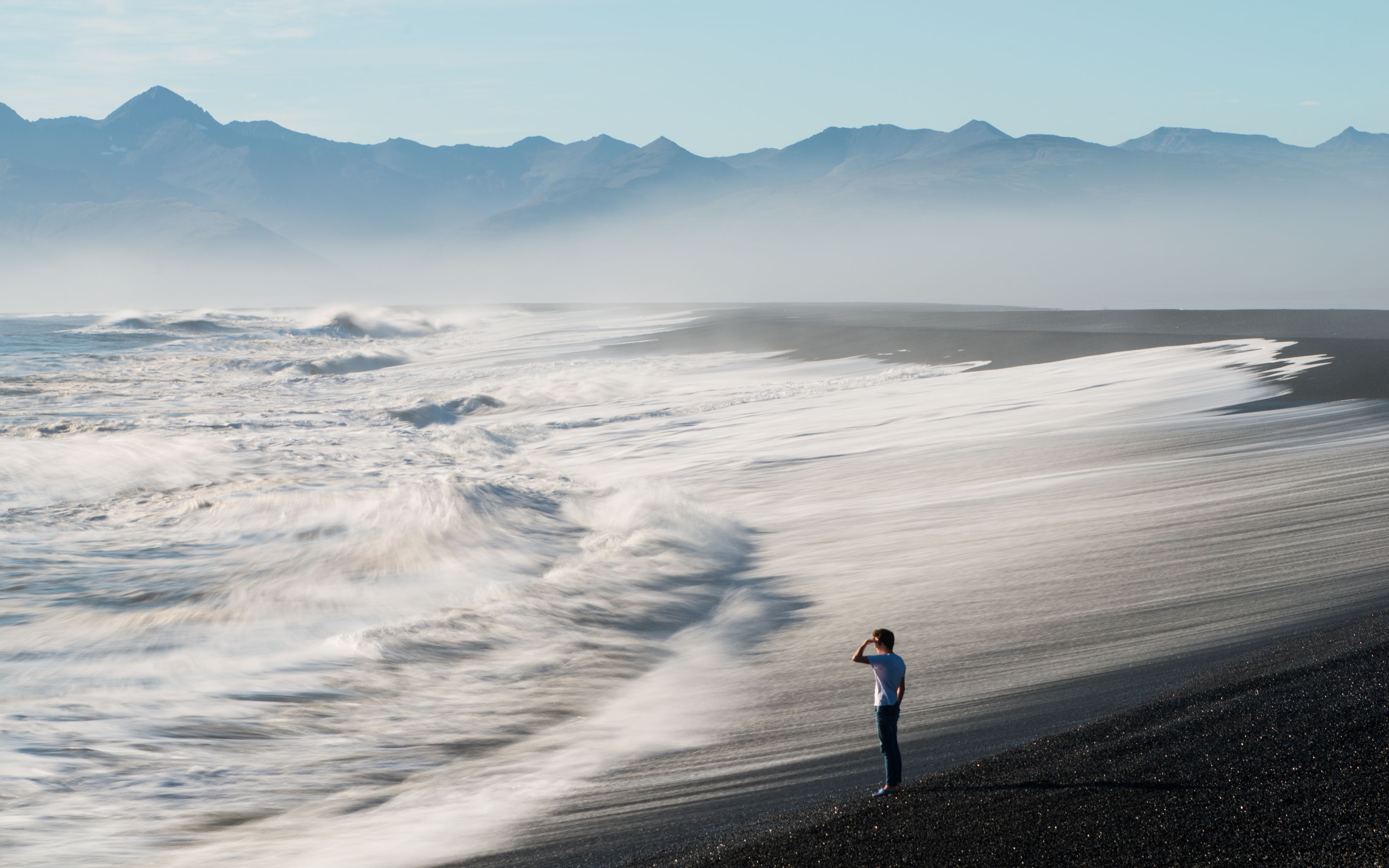 Man in a Black Sand Beach in Iceland