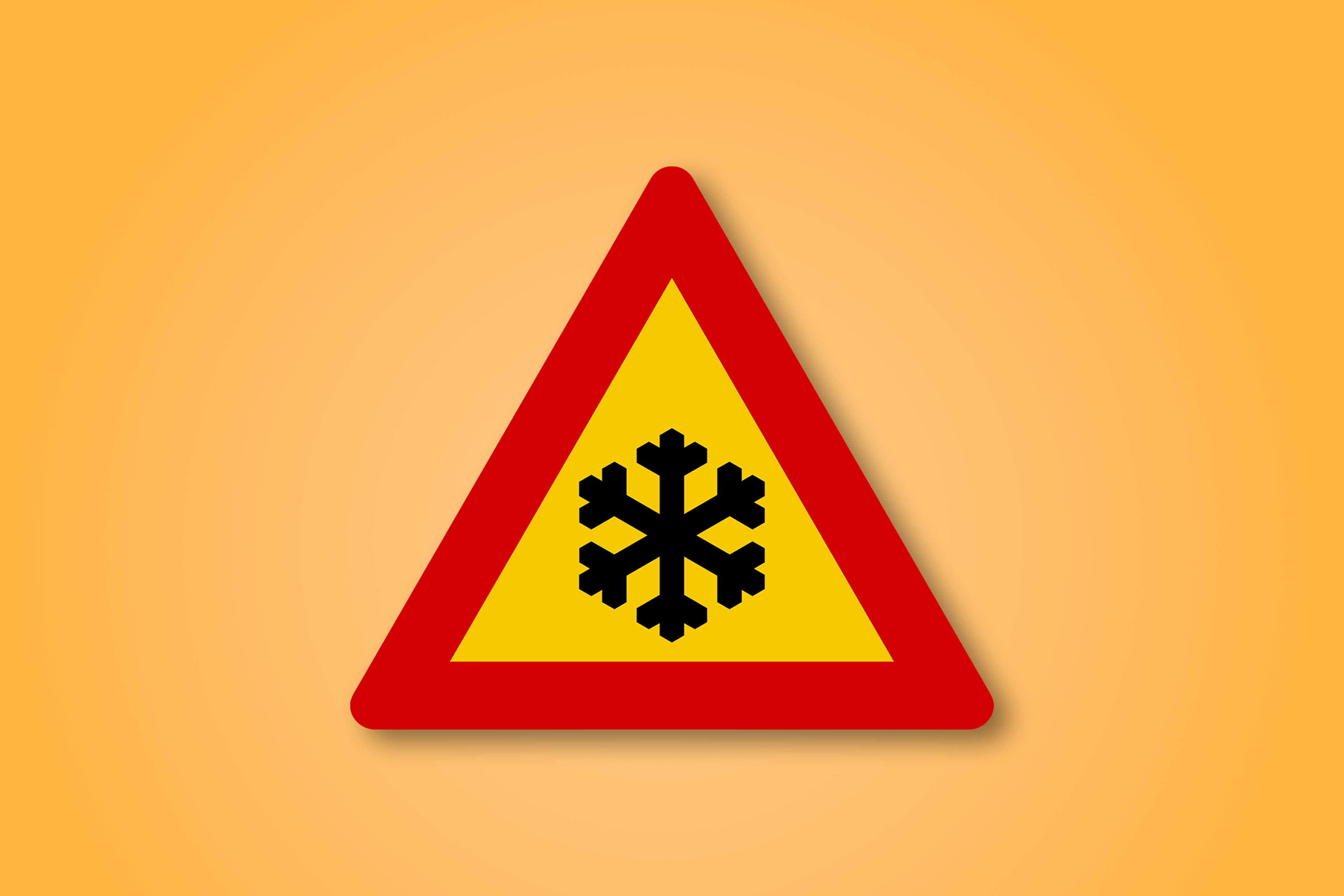 一块红色和黄色的三角形路标，中间有一个雪花。这个路标表示道路结冰。
