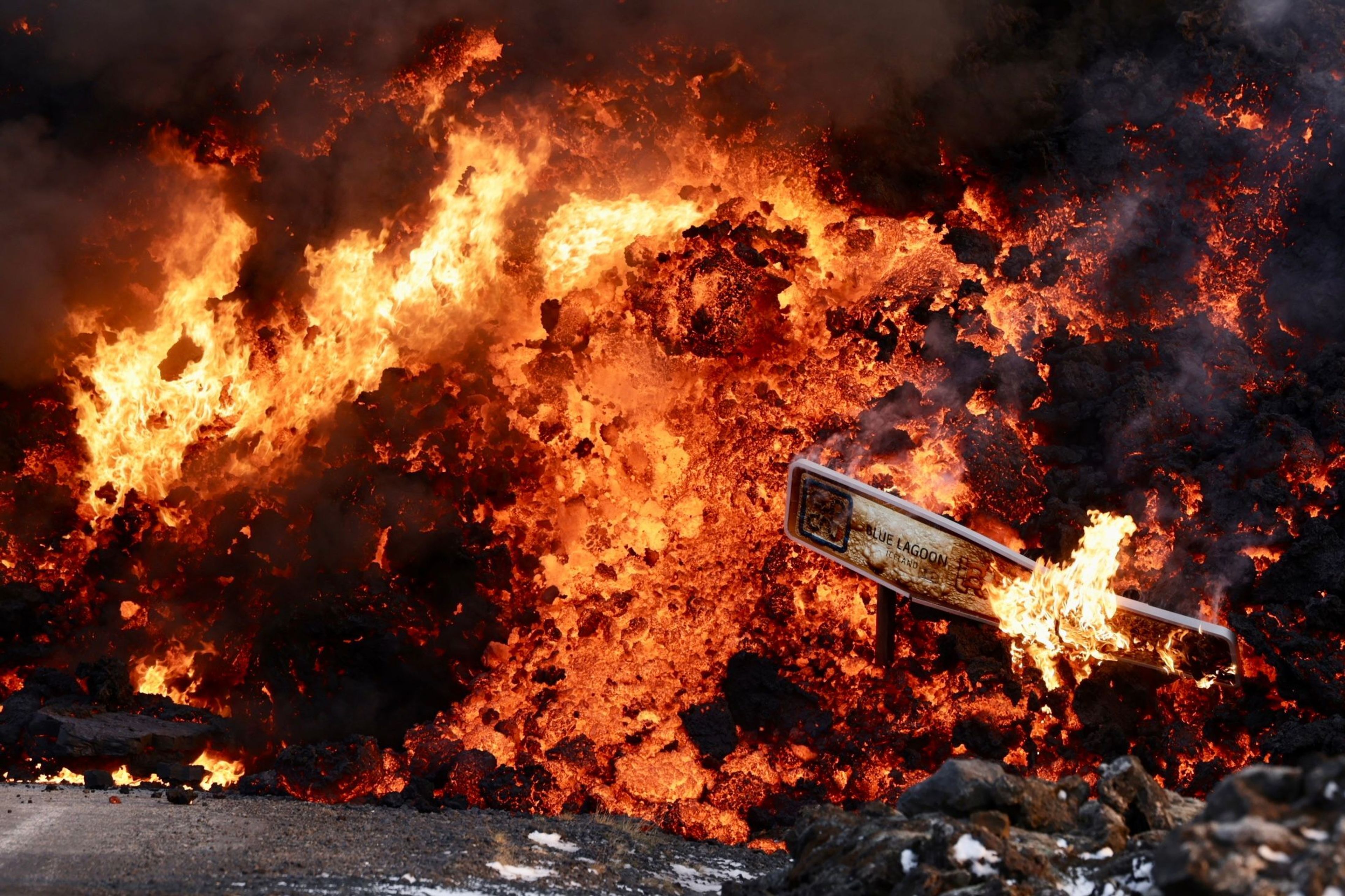 Lava destroying a road sign