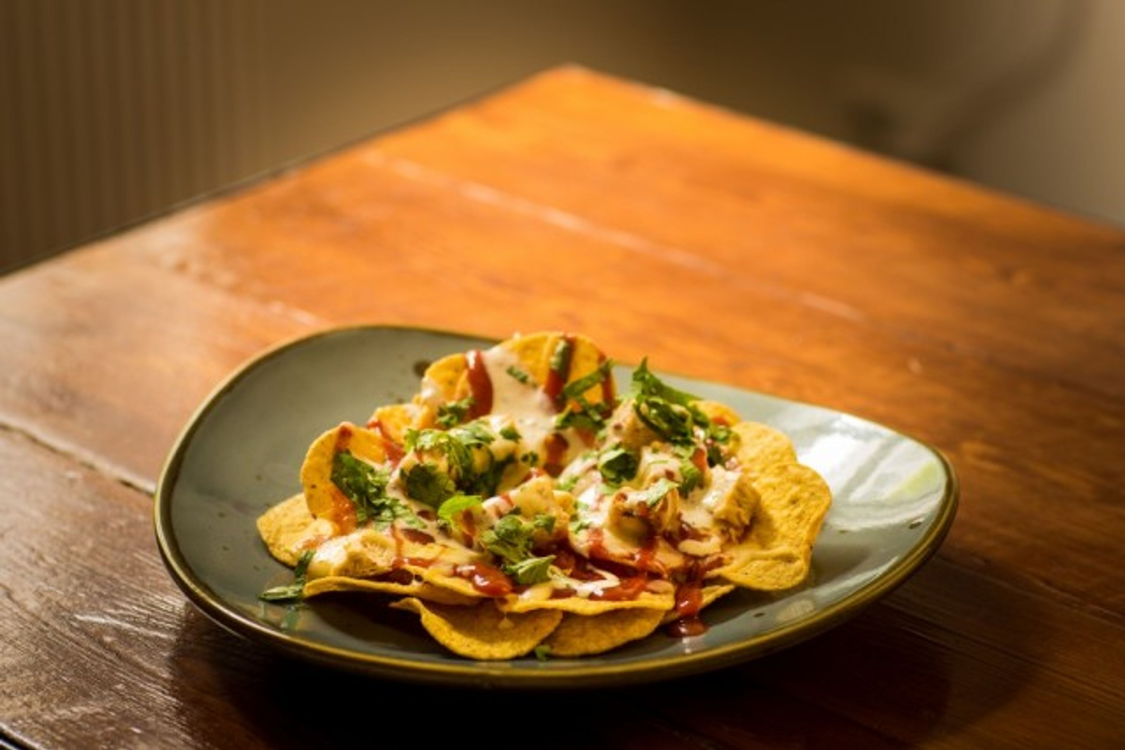 A plate of well presented nachos 
