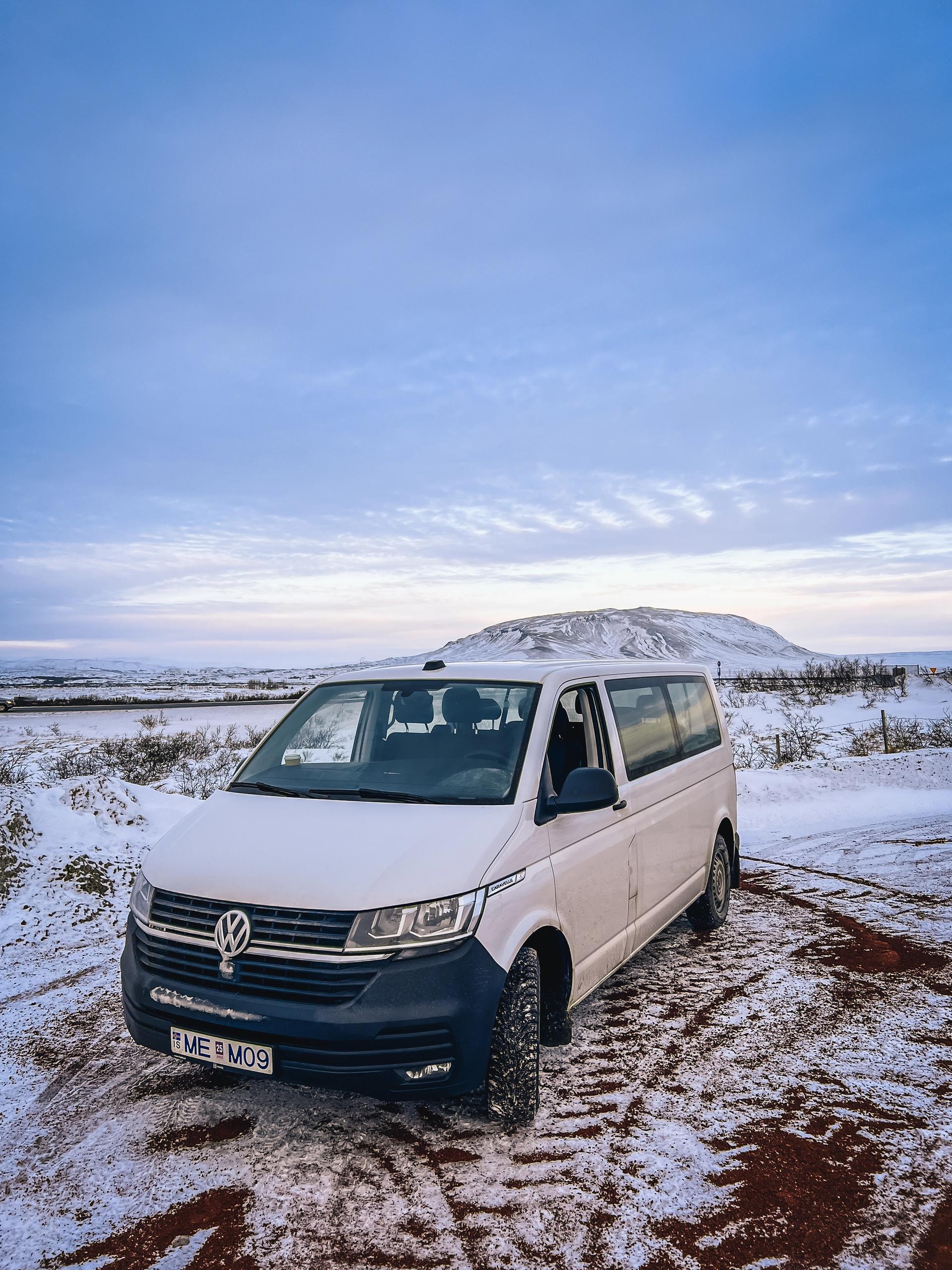 The Volkswagen minivan for 9 people in winter road of Iceland