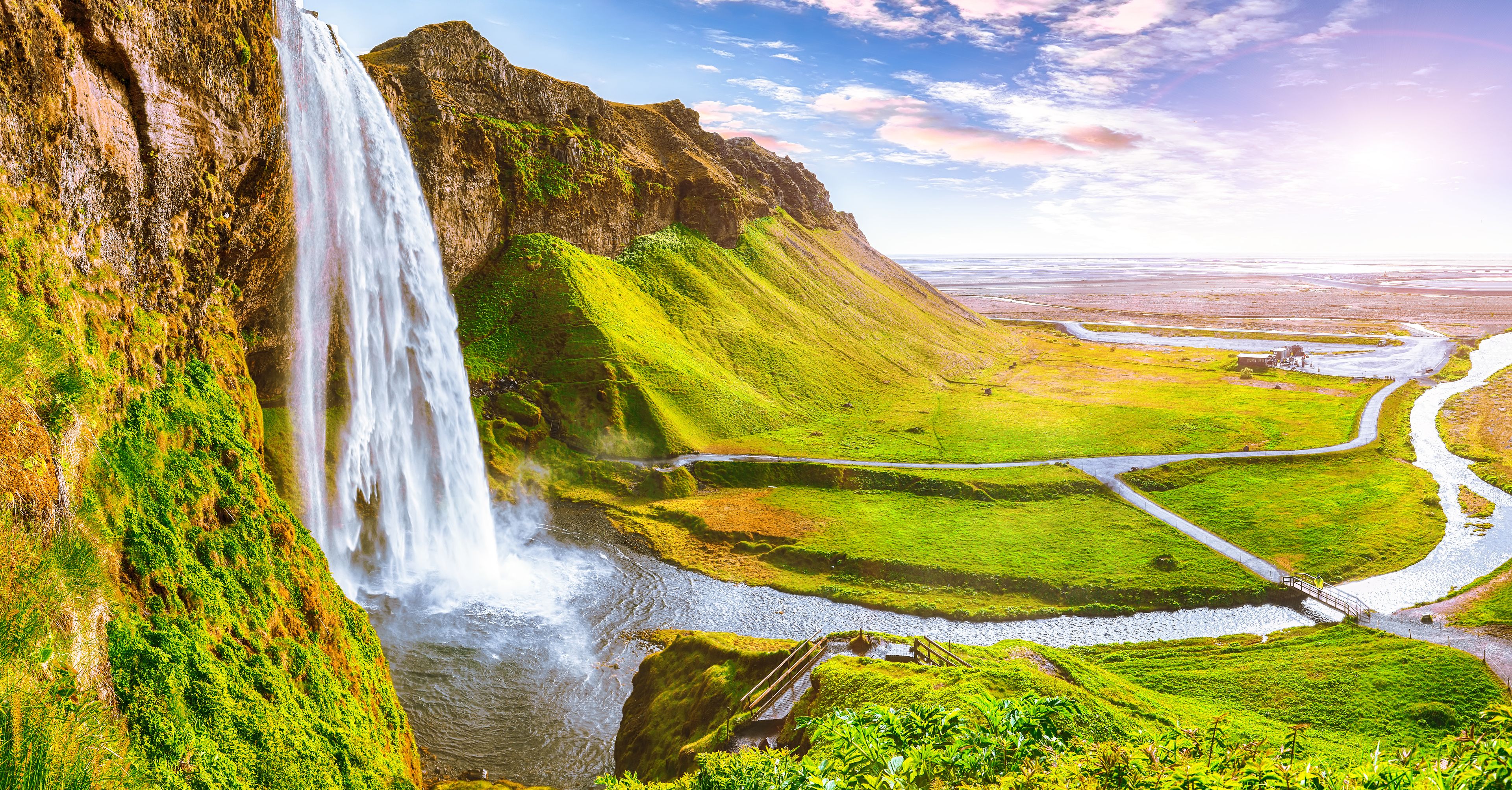 Seljalandsfoss waterfall in Iceland during sunny day.