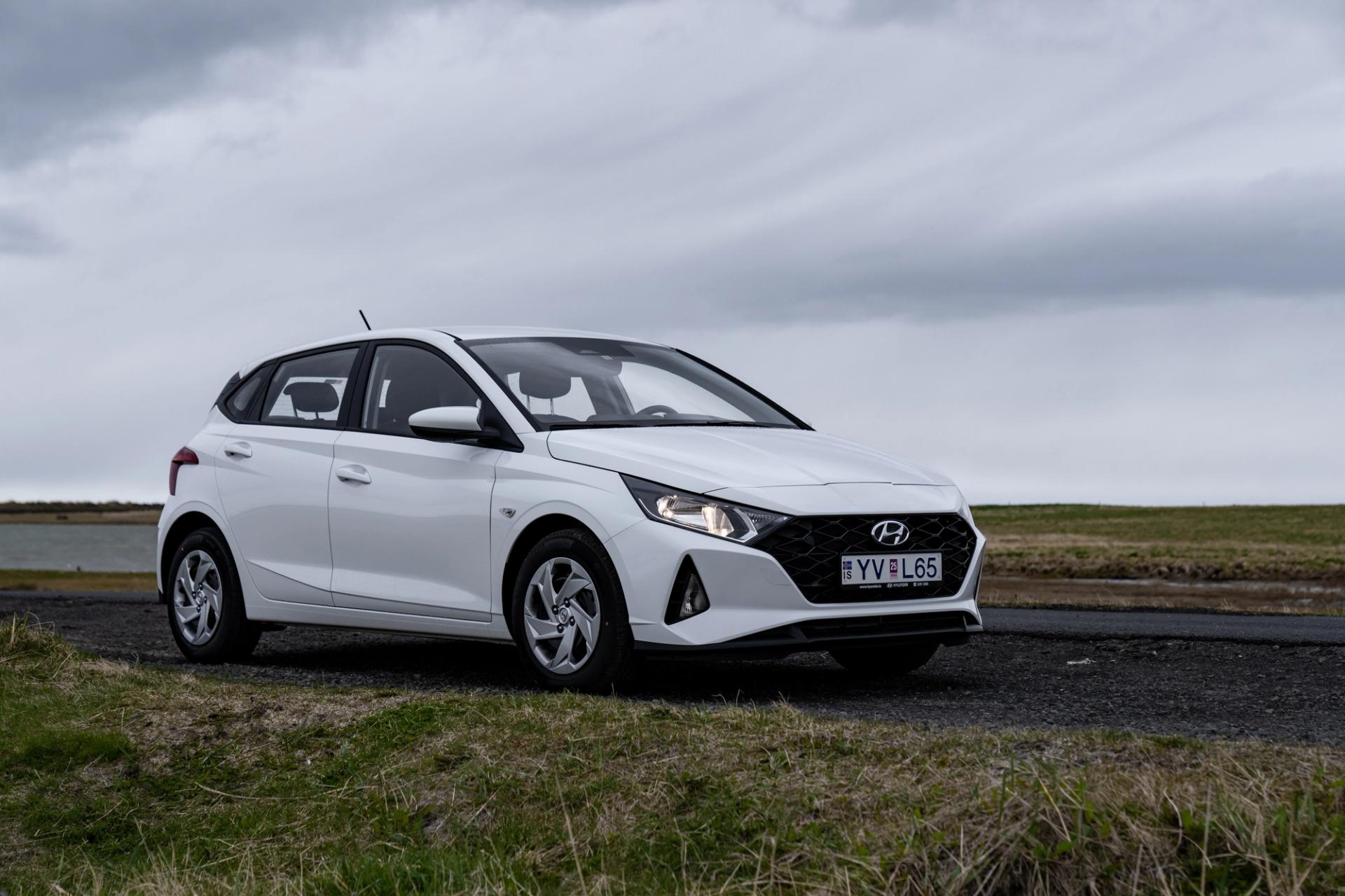 Hyundai i20 rental car in Iceland parked on a gravel road