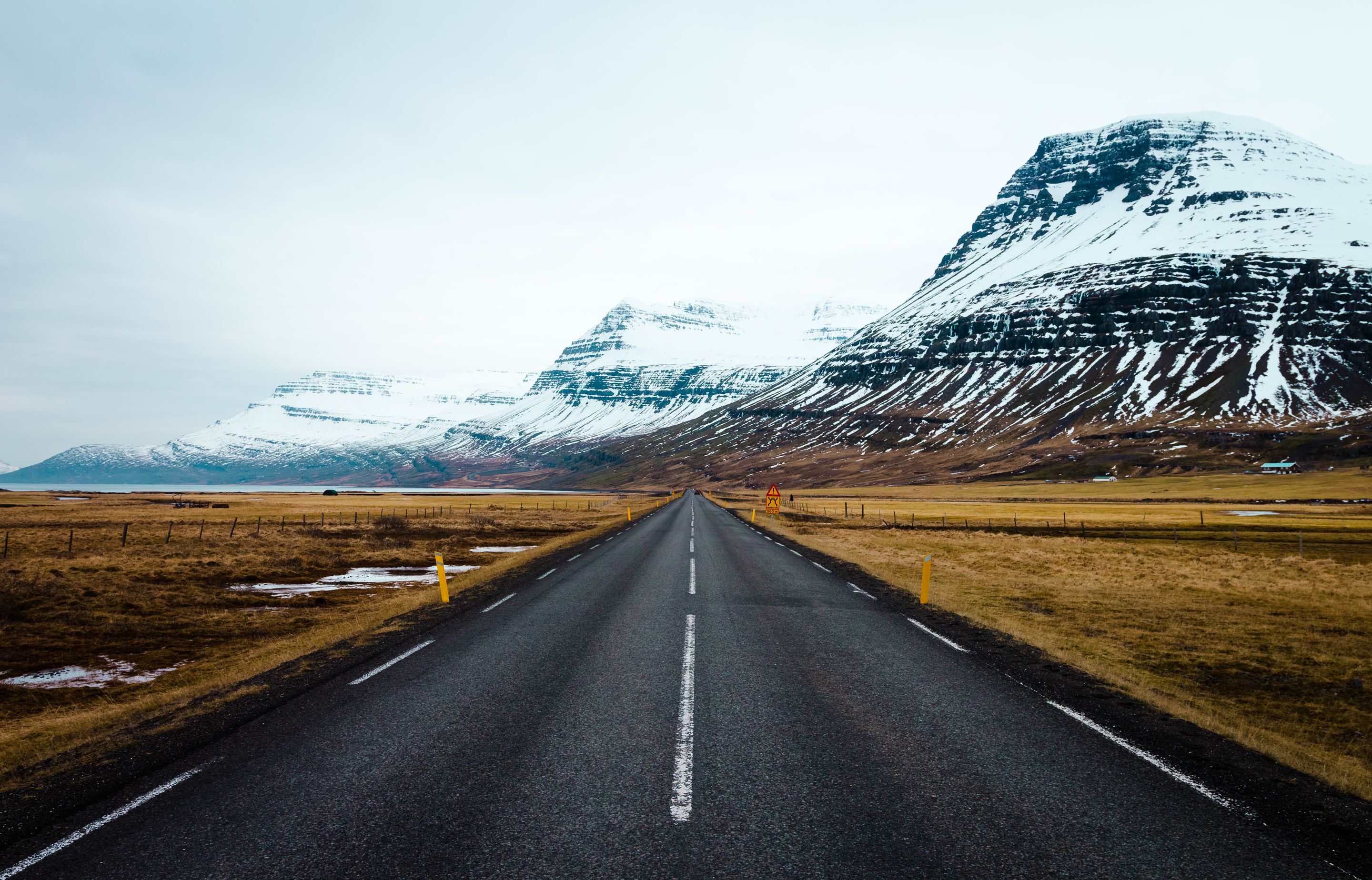 Part of the Iceland Ring Road with snowed mountains